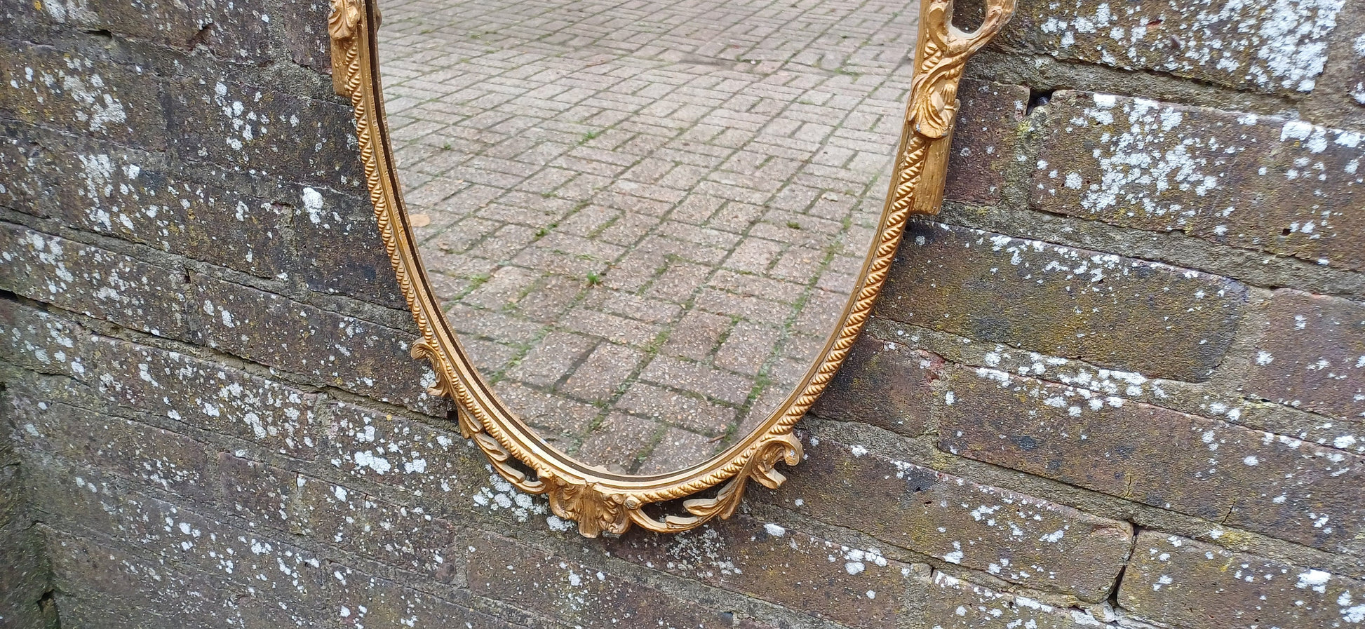 Beautiful Vintage 80s or 90s Ornate Oval Metal Gold Italian Style Wall Mirror Flower in Basket Decoration