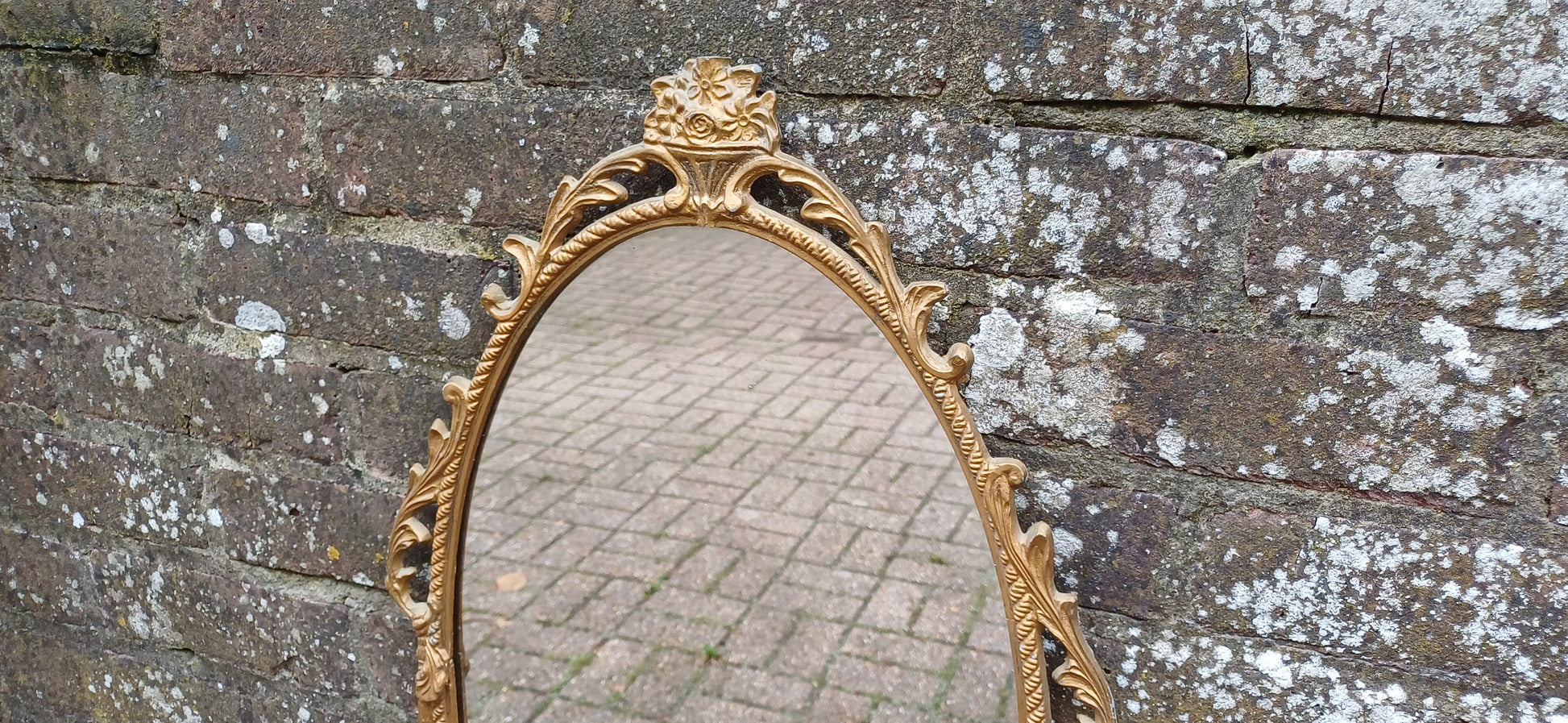 Beautiful Vintage 80s or 90s Ornate Oval Metal Gold Italian Style Wall Mirror Flower in Basket Decoration