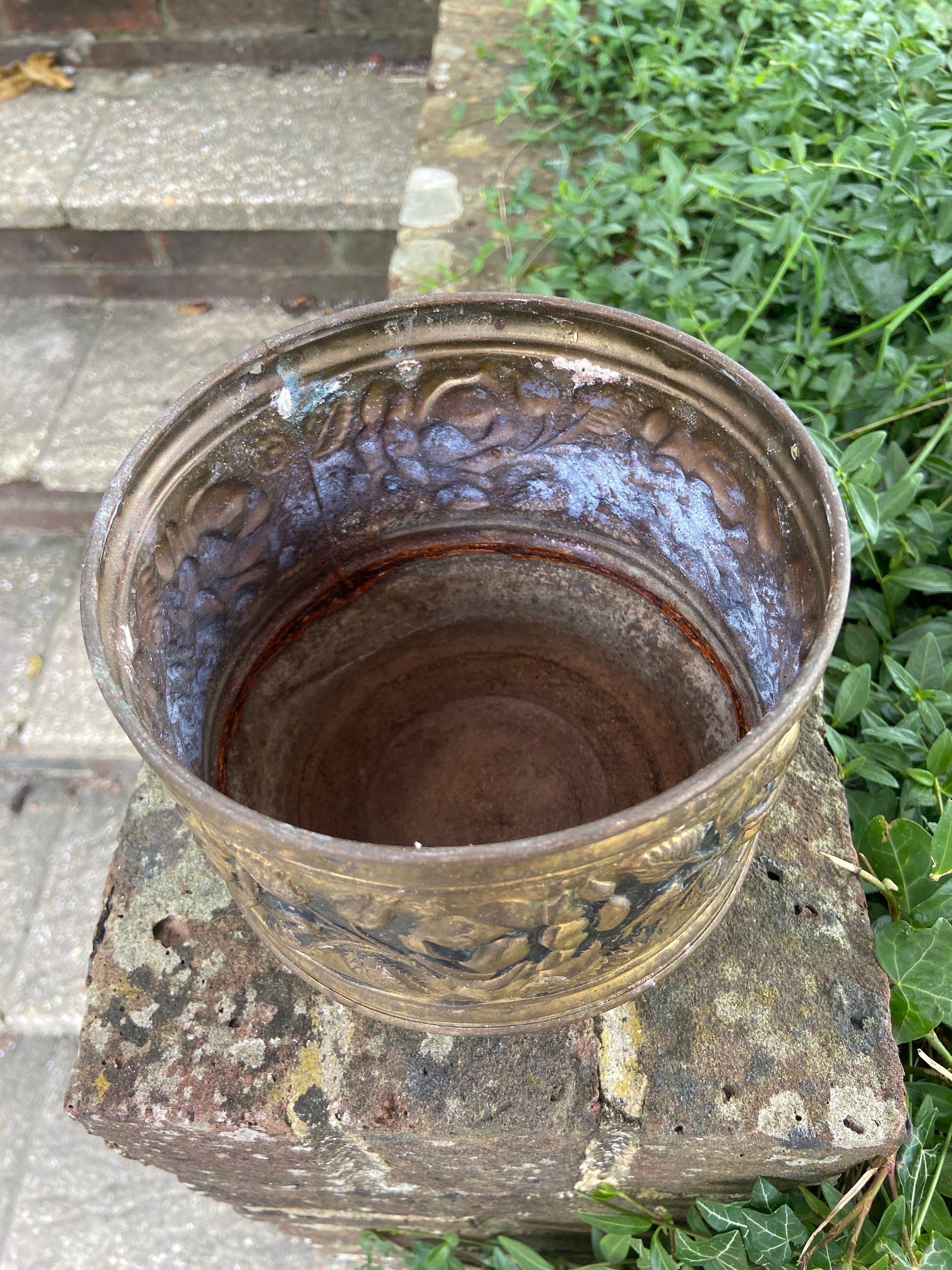 three brass planters, two simialr
