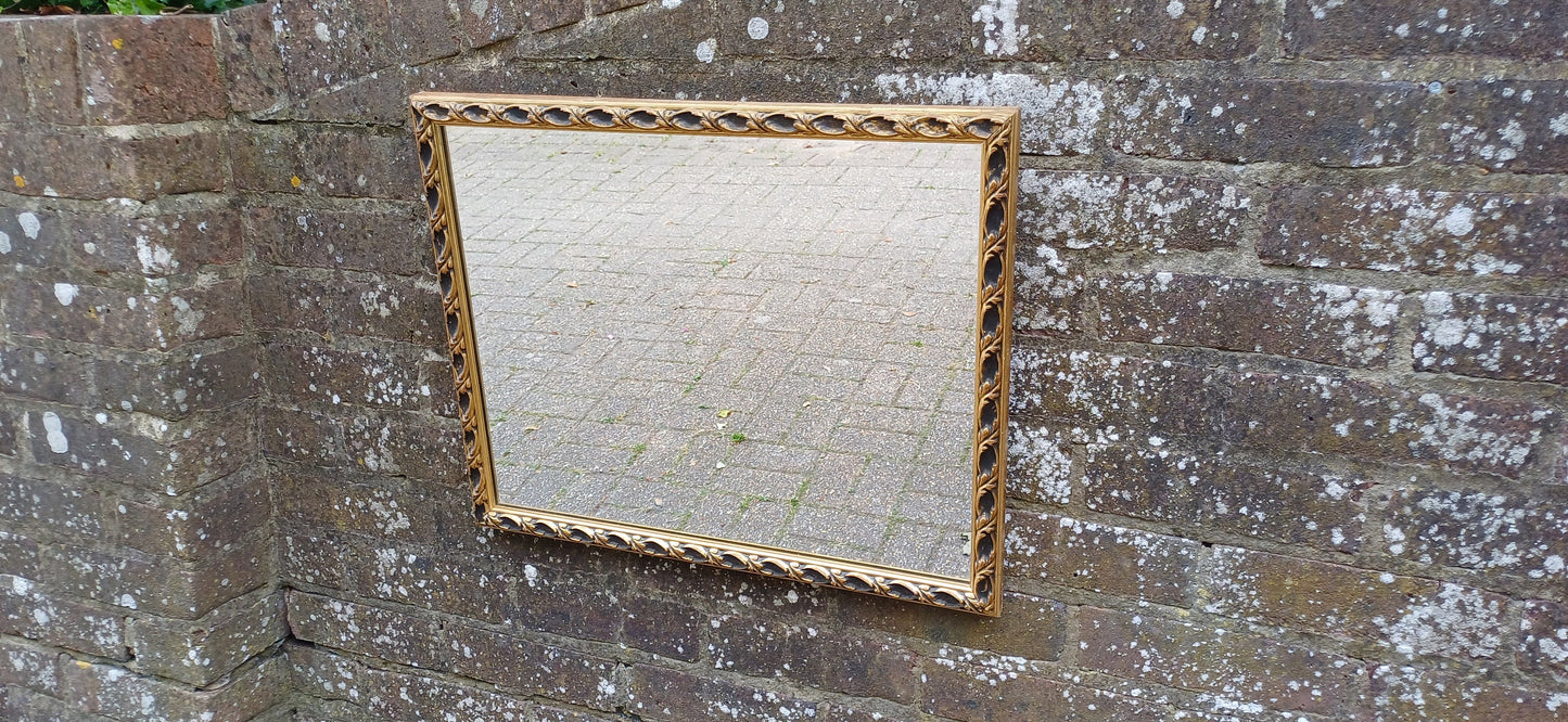 Large Vintage 60s Gold and Black Ornate Wall Mirror.