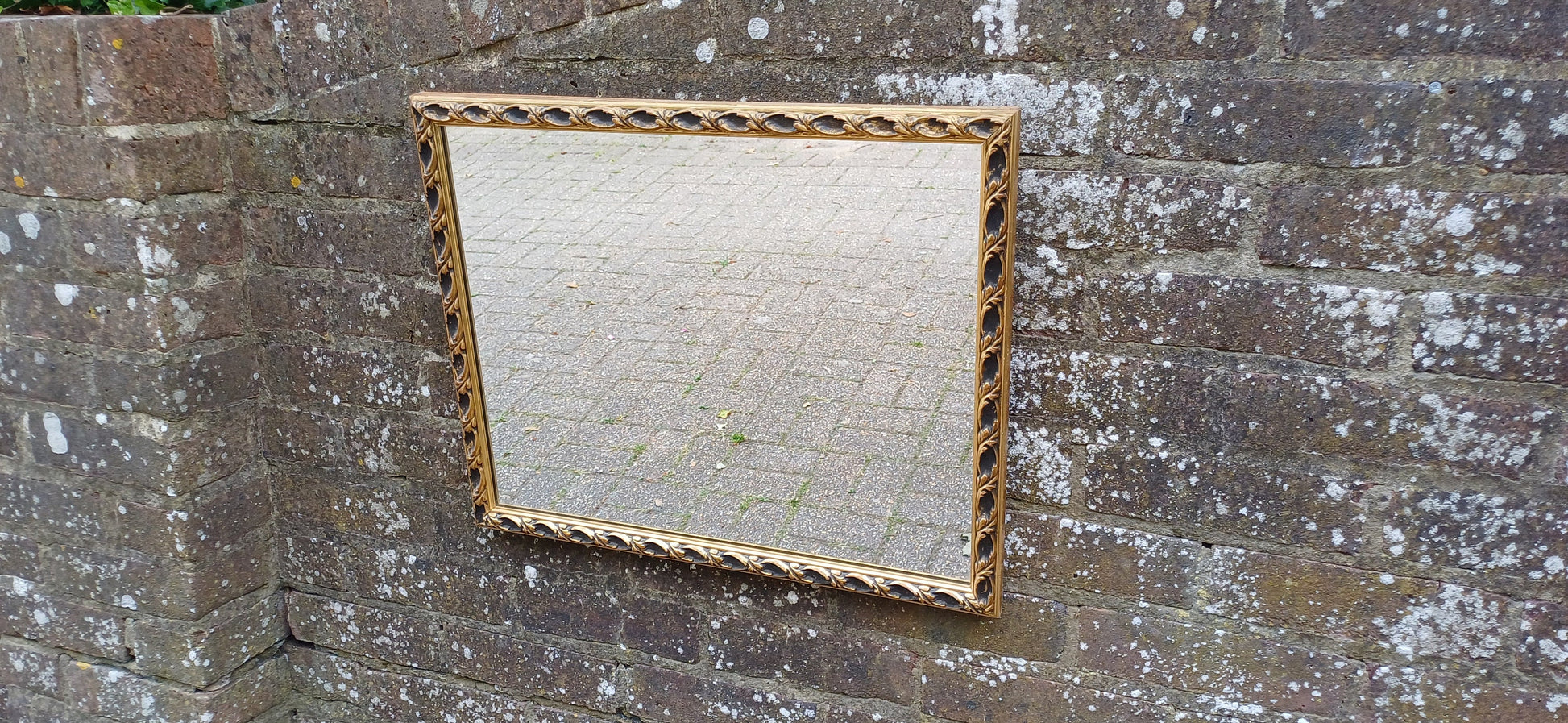 Large Vintage 60s Gold and Black Ornate Wall Mirror.