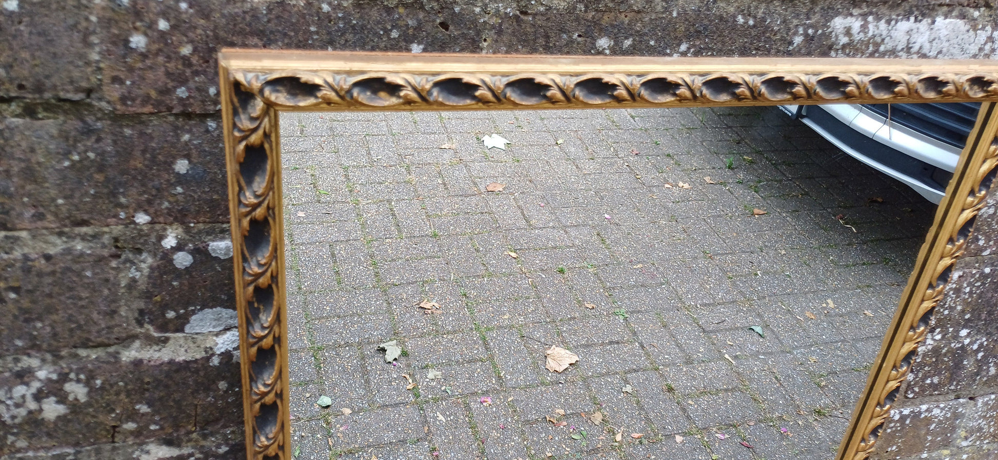 Large Vintage 60s Gold and Black Ornate Wall Mirror.