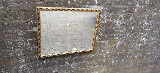 Large Vintage 60s Gold and Black Ornate Wall Mirror.