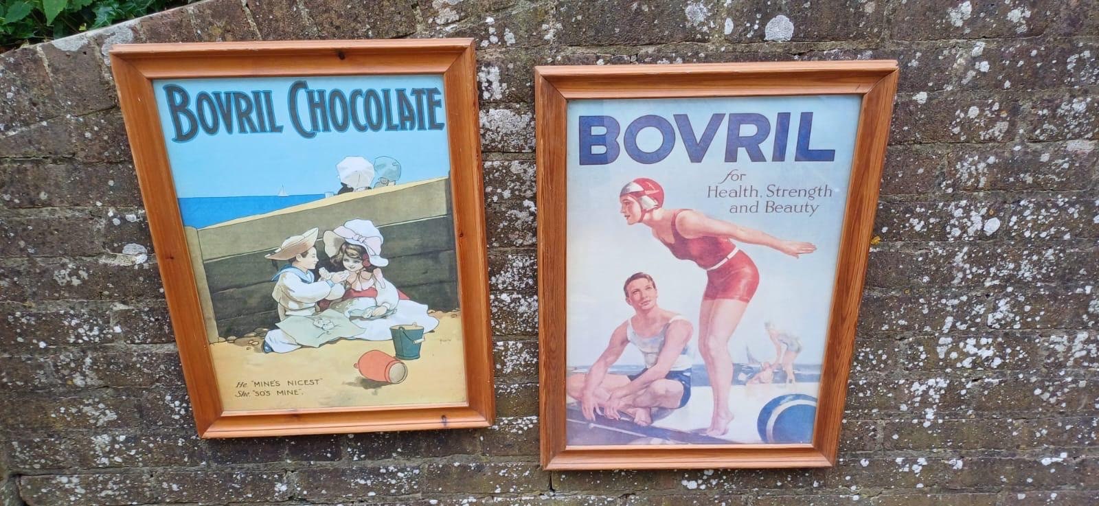 vintage bovril posters, one with man and woman swimming, and on with two children on the beach. advertising posters for bovril. framed in lovely vintage pine frames. quite large.