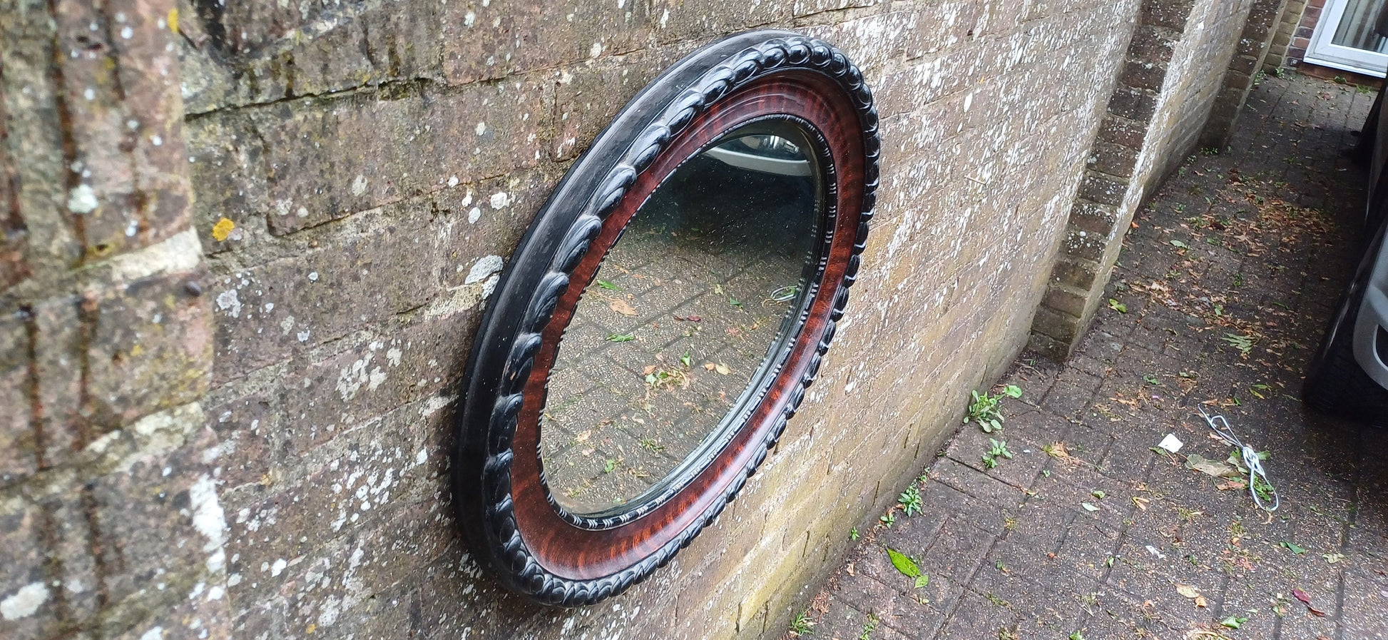 Vintage Early 20th Century Chunky Oval Decorative Mirror Black and Maroon Hues