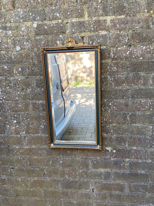 early 1900s vintage wall mirror. gorgeous gilt and green detailed frame. excellent quality bevelled glass. original backing and chain. Superb mirror with loads of charm.