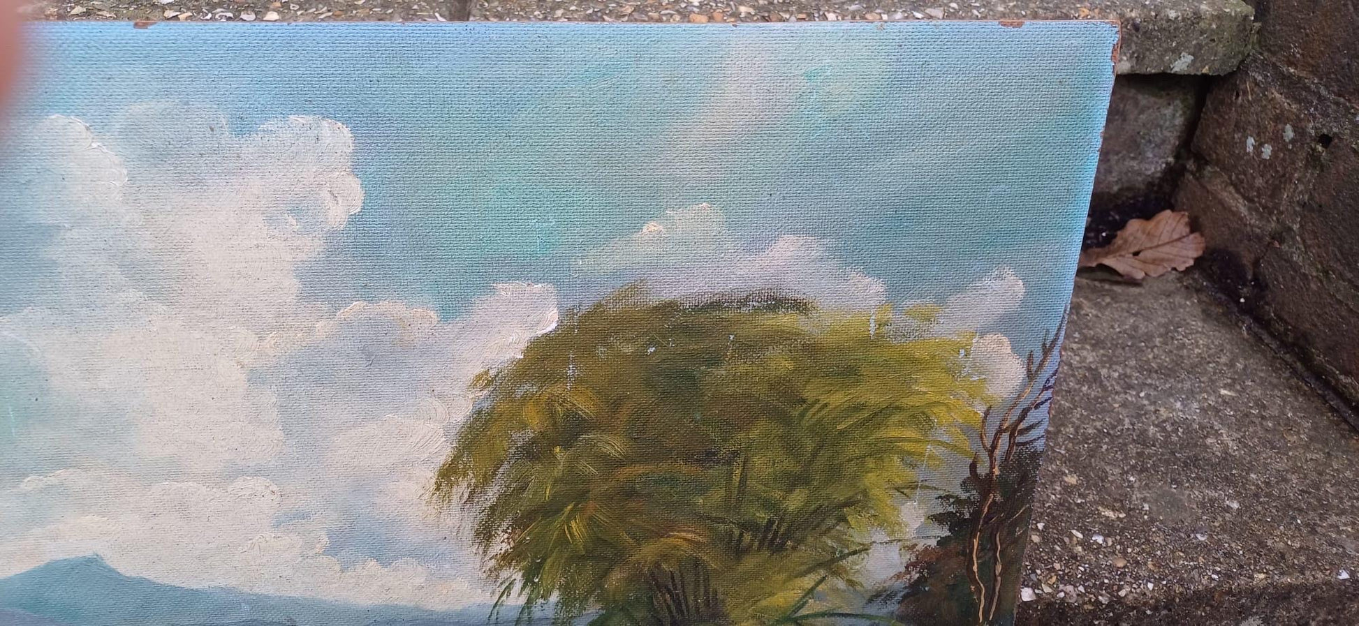 1960s oil on board by artist Yusoff Abdullah. Rural scene of a villager / farmer carrying goods across a field. Signed painting