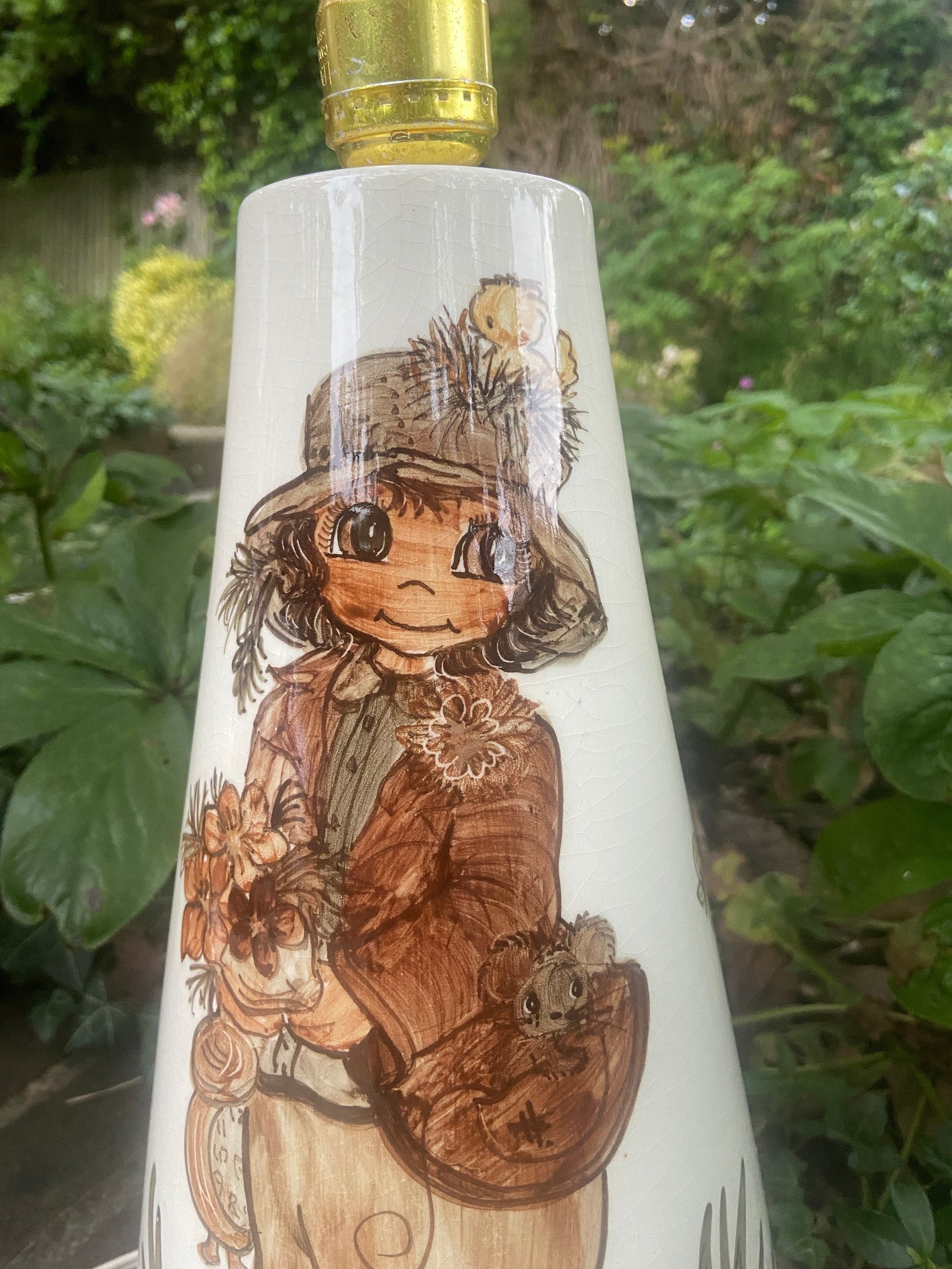 1970s retro Jersey Pottery large table lamp of a wide eyed boy character - delightful working condition
