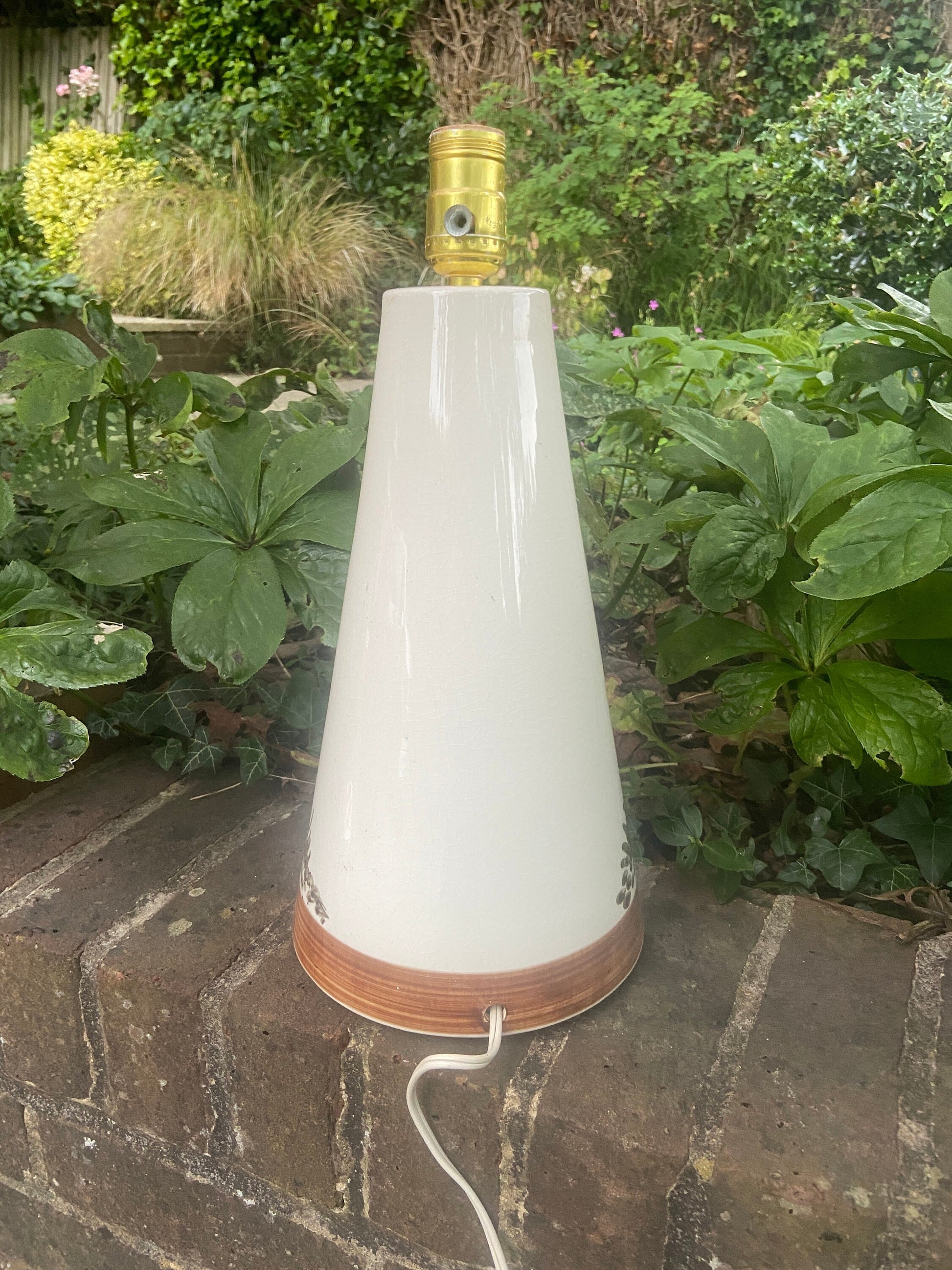 1970s retro Jersey Pottery large table lamp of a wide eyed boy character - delightful working condition