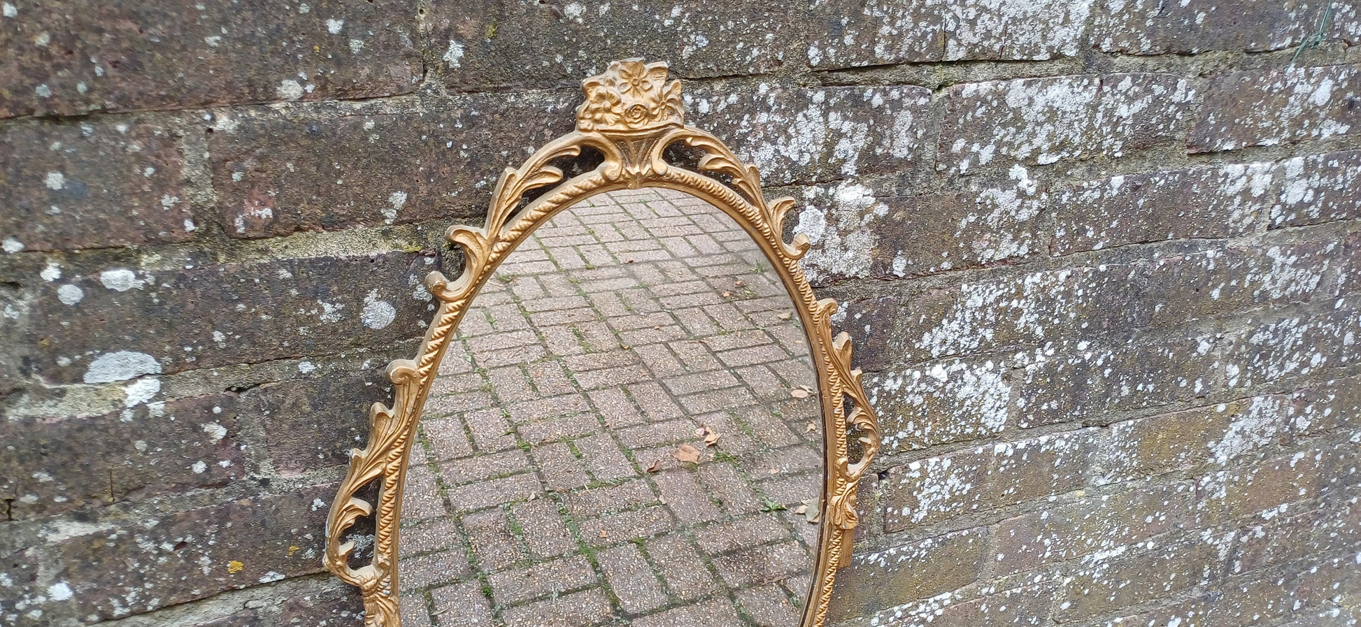 Beautiful Vintage 80s or 90s Ornate Oval Metal Gold Italian Style Wall Mirror Flower in Basket Decoration