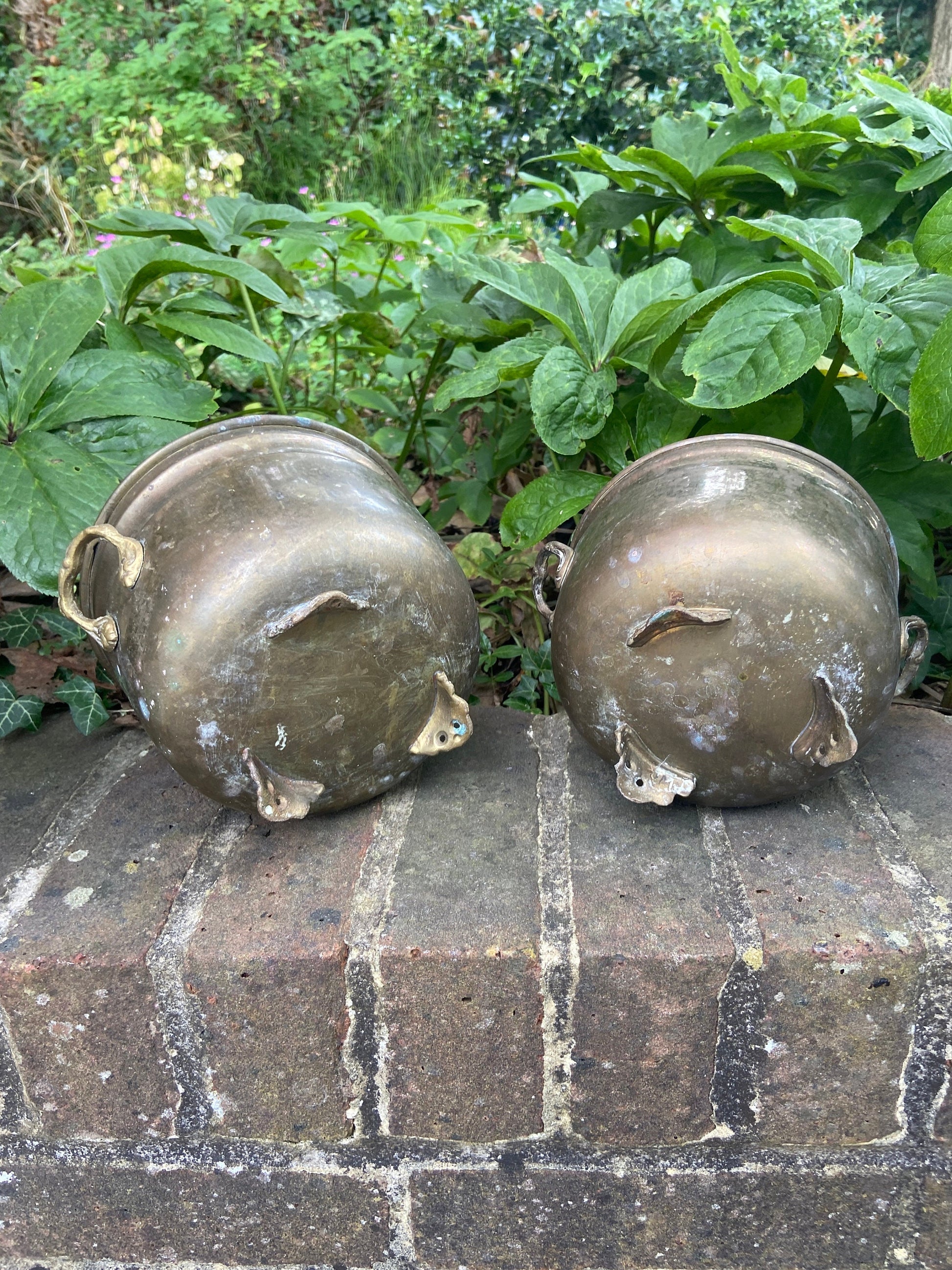 three brass planters, two simialr