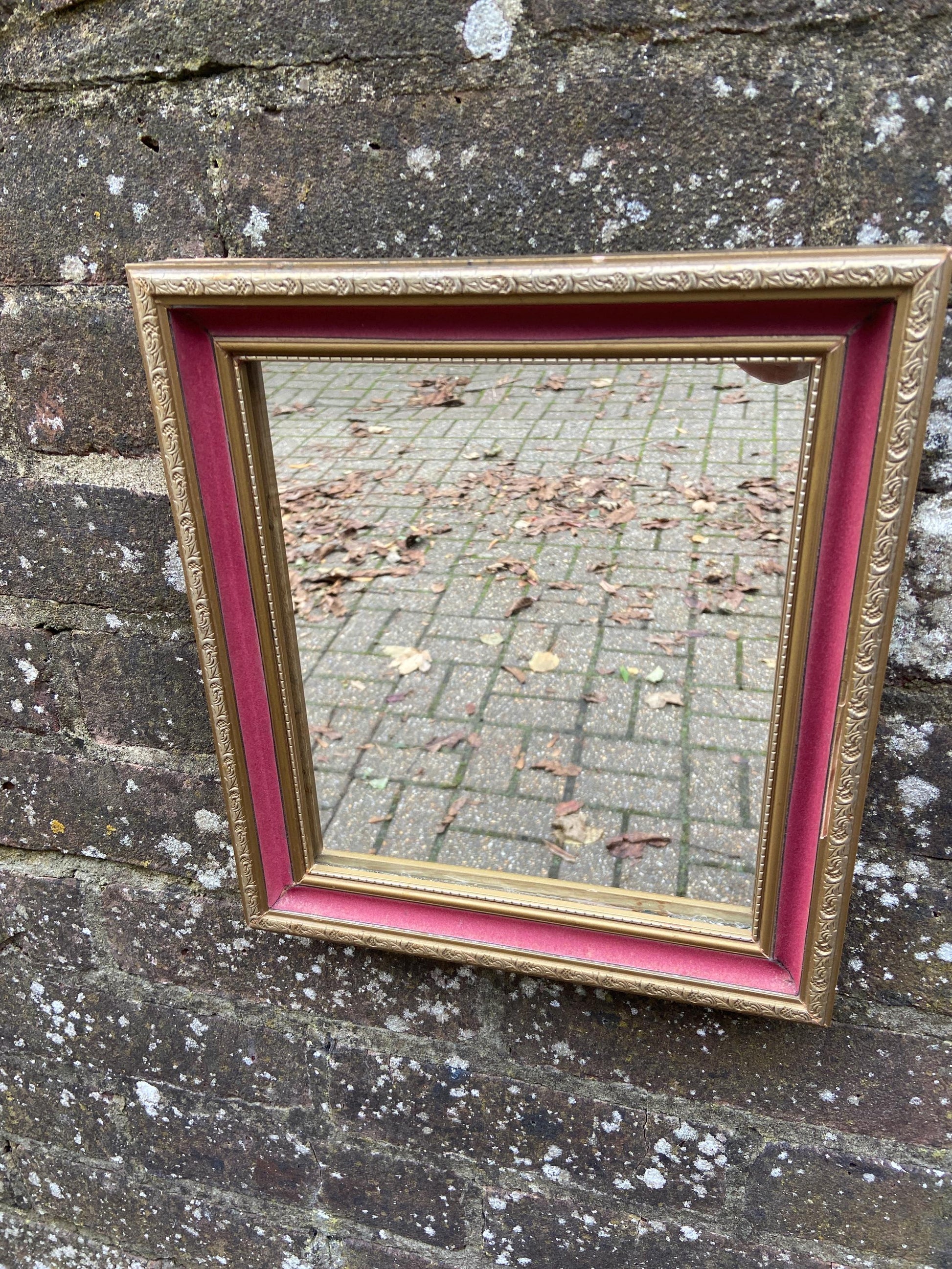 Pretty vintage vanity mirror with pink velvet and gilt finish