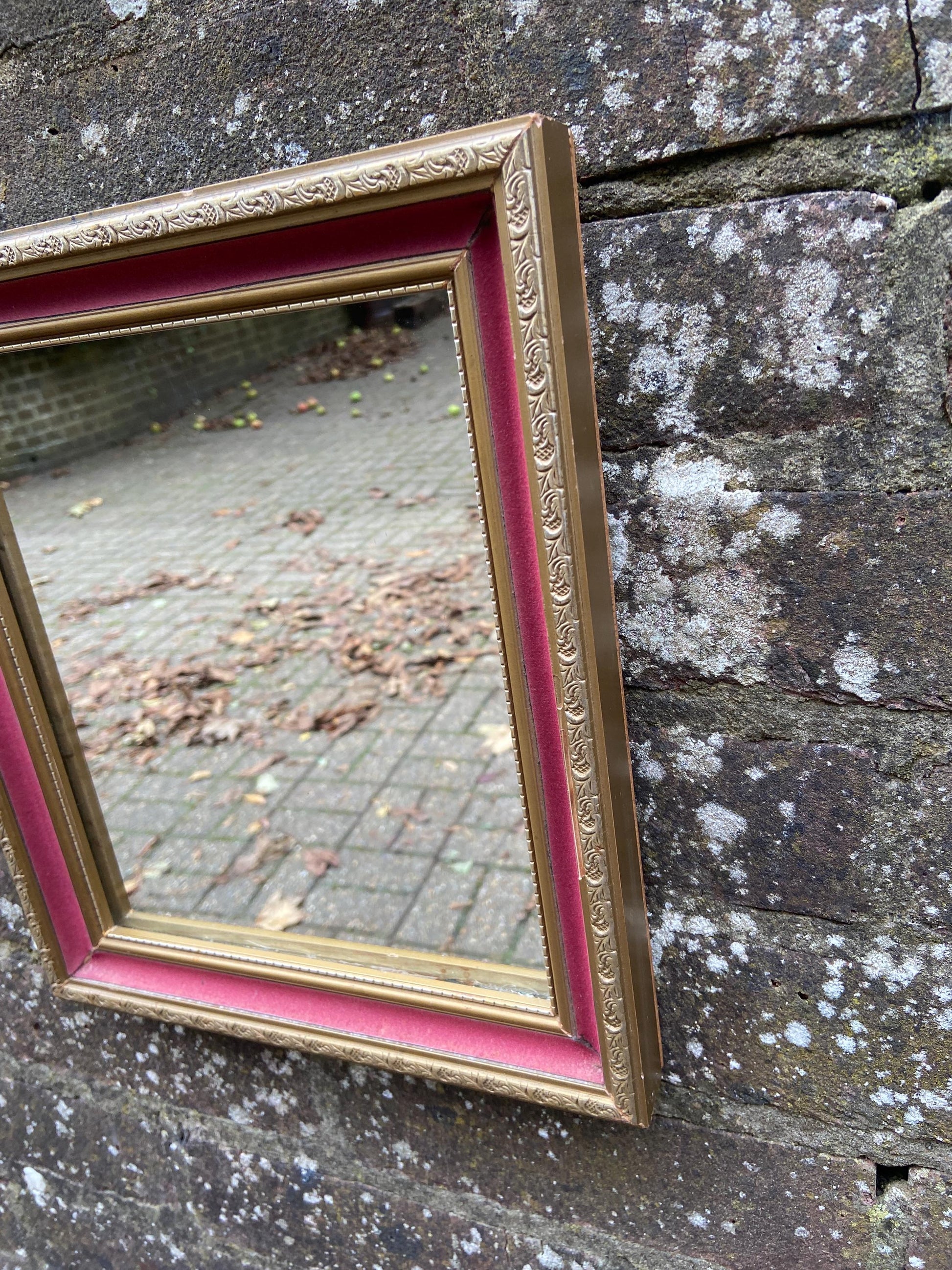 Pretty vintage vanity mirror with pink velvet and gilt finish