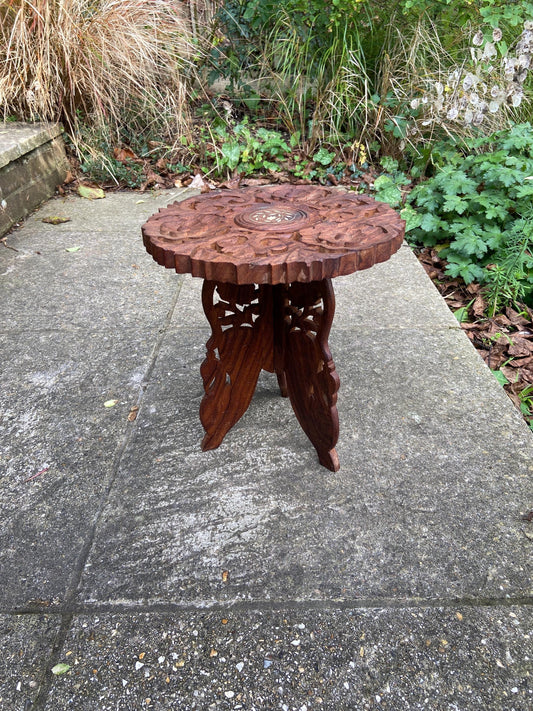 small carved table. folding table. Asian table. end table. coffee table. wooden plant stand wood table