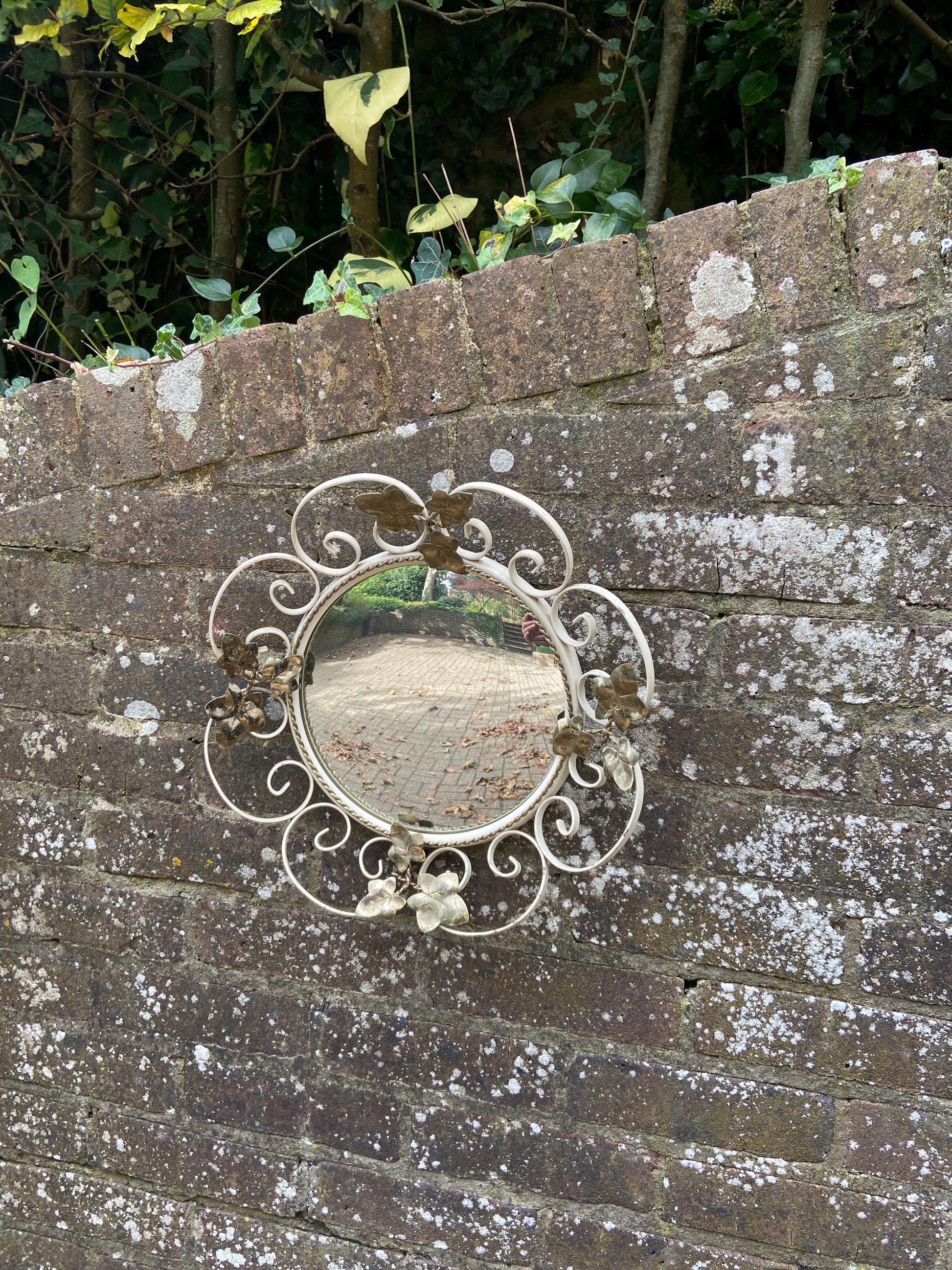 Retro wrought iron painted round mirror with Ivy details