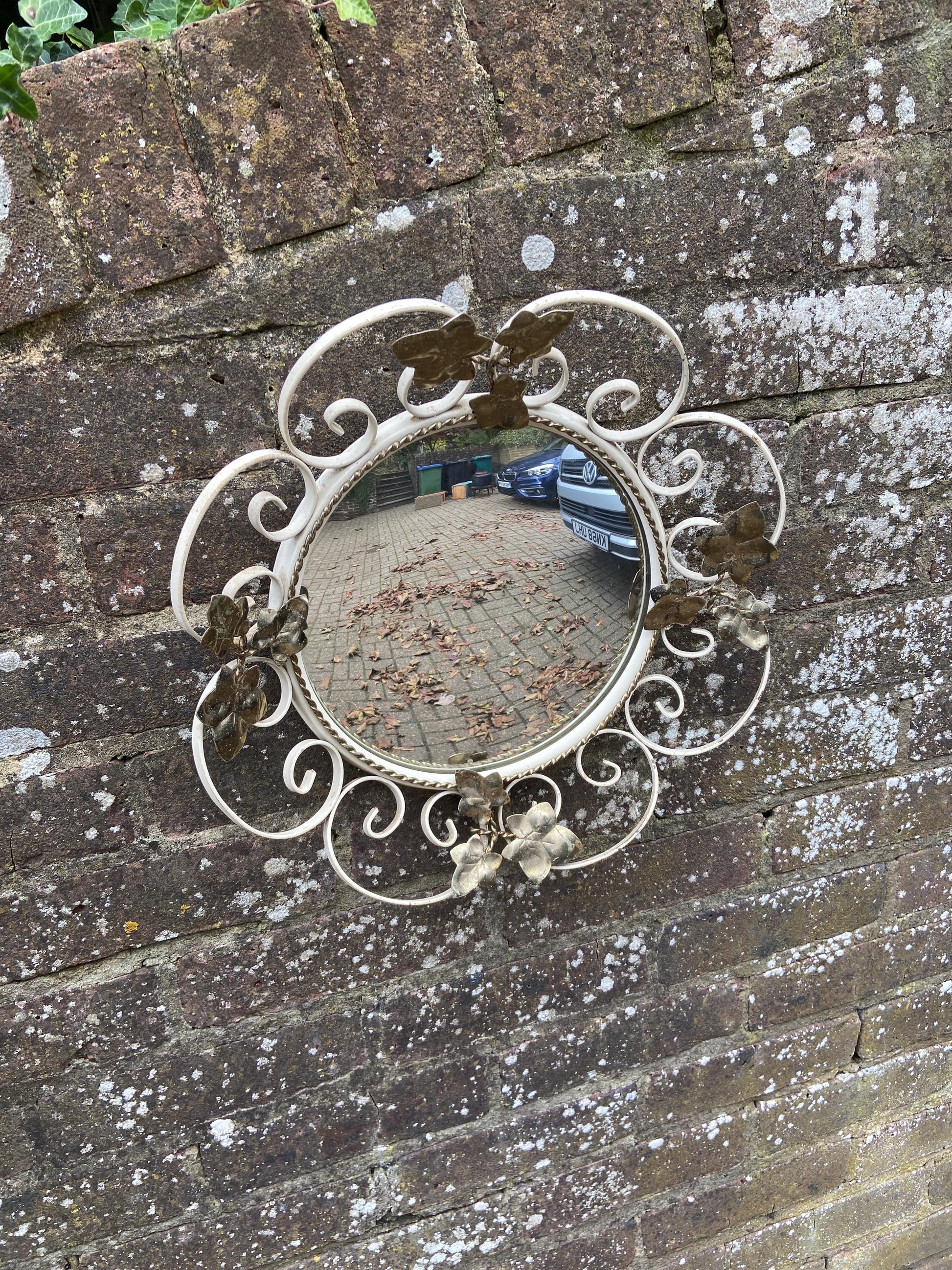 Retro wrought iron painted round mirror with Ivy details