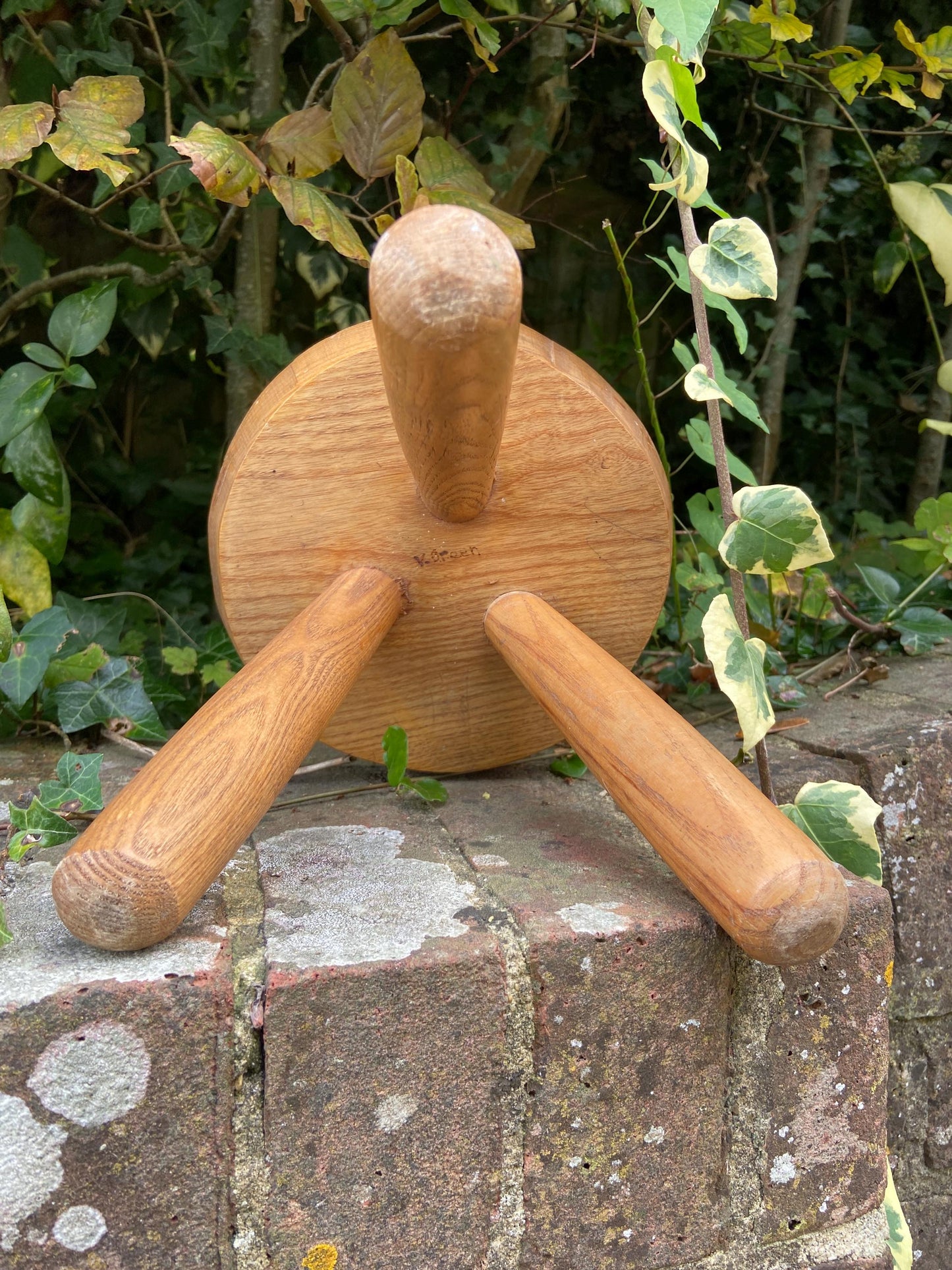 Vintage children’s milking stool with an engraved fairytale woodland owl on it