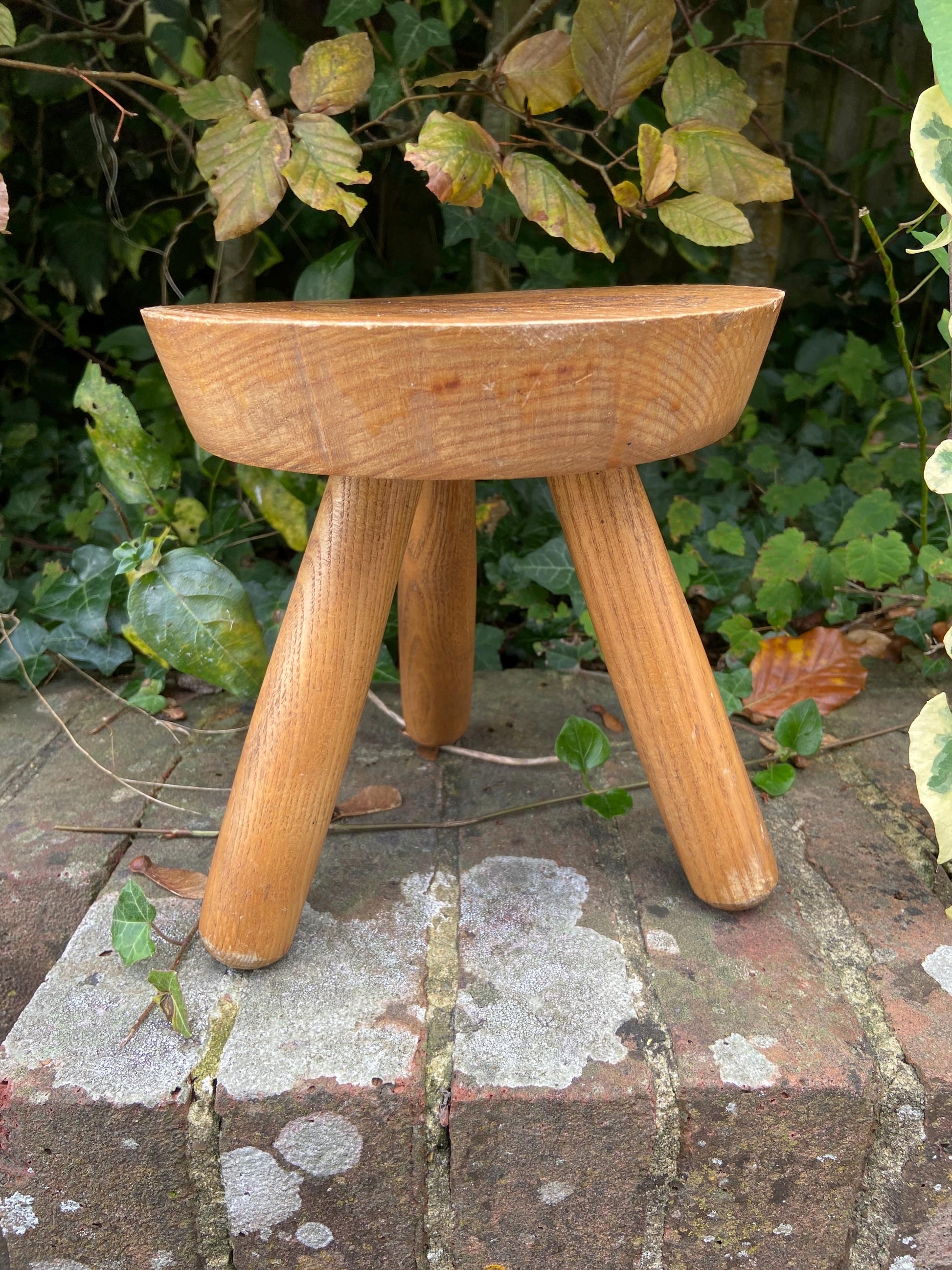 Vintage children’s milking stool with an engraved fairytale woodland owl on it