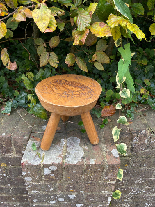 Vintage children’s milking stool with an engraved fairytale woodland owl on it