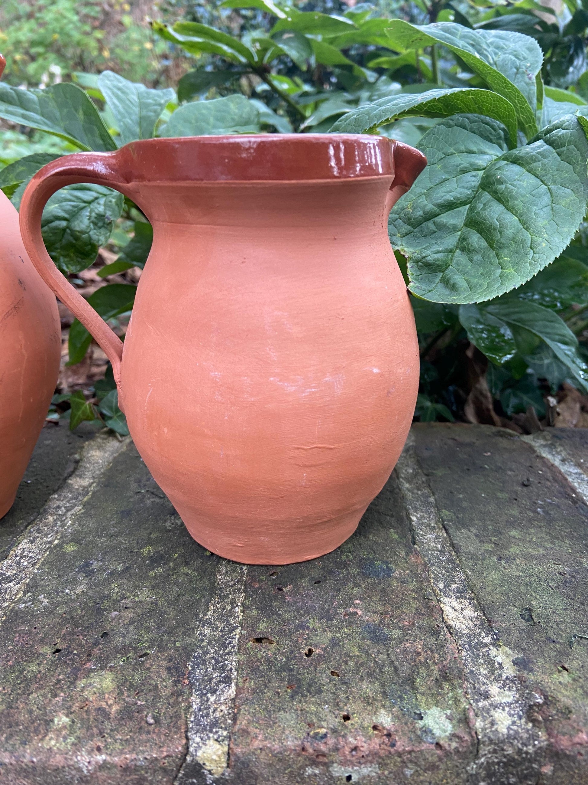 Mrs Brannam’s Devon Terracotta vintage set of two breakfast jugs – one for Fruit Juice and one for Milk. Perfect for a B&B.