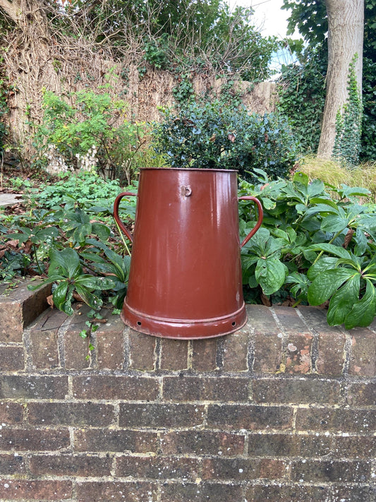very large metal bucket or pot, useful for storage or for a plant pot, vase of some sort. metal and painted in rust colour. early to mid 20th century, from 1900s. for walking sticks and umbrellas. plant pot. planter indoors or outdoors