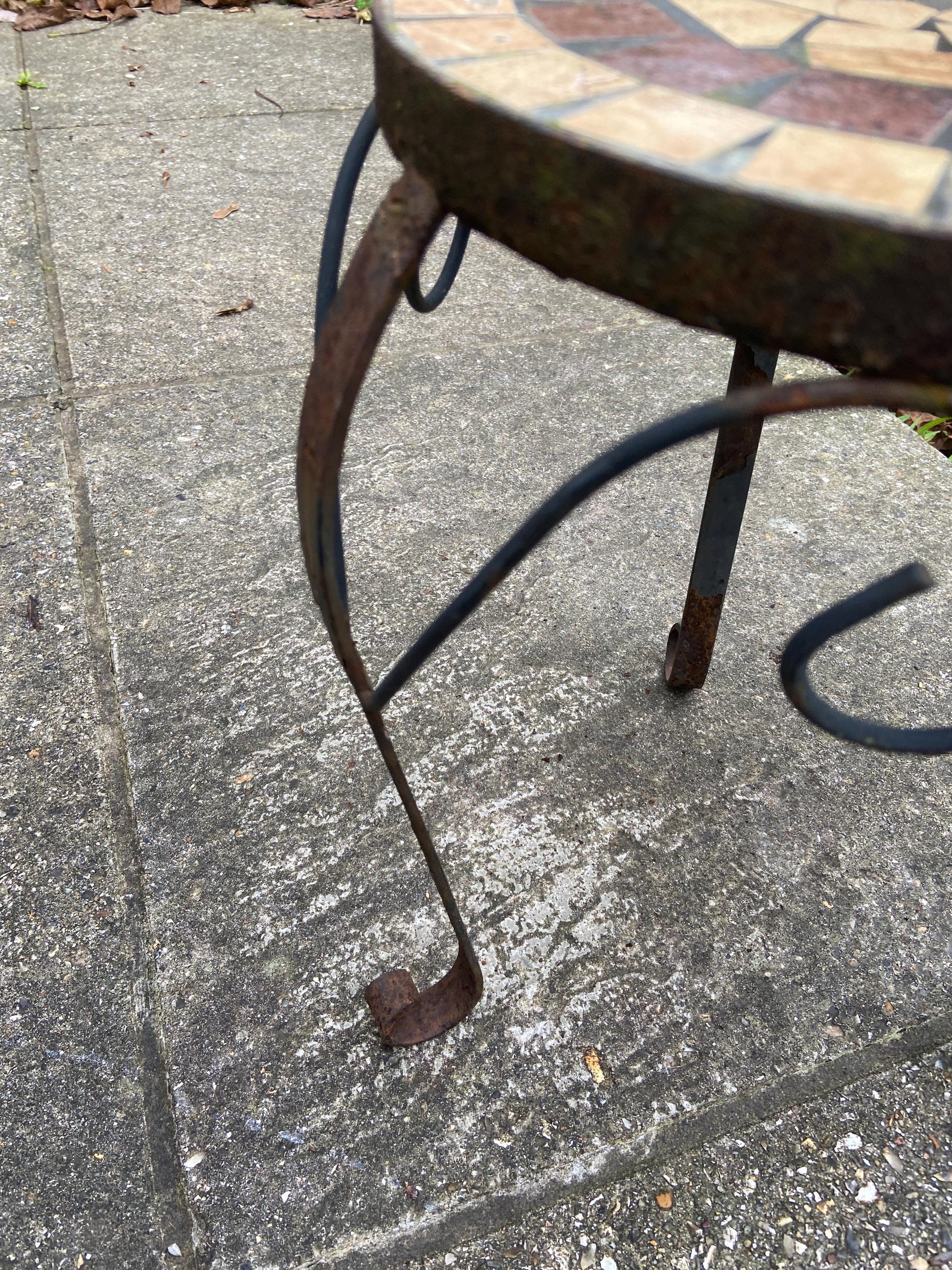 Vintage small to medium sized wrought iron metal table with tiled mosaic top - indoor or outdoor plant stand