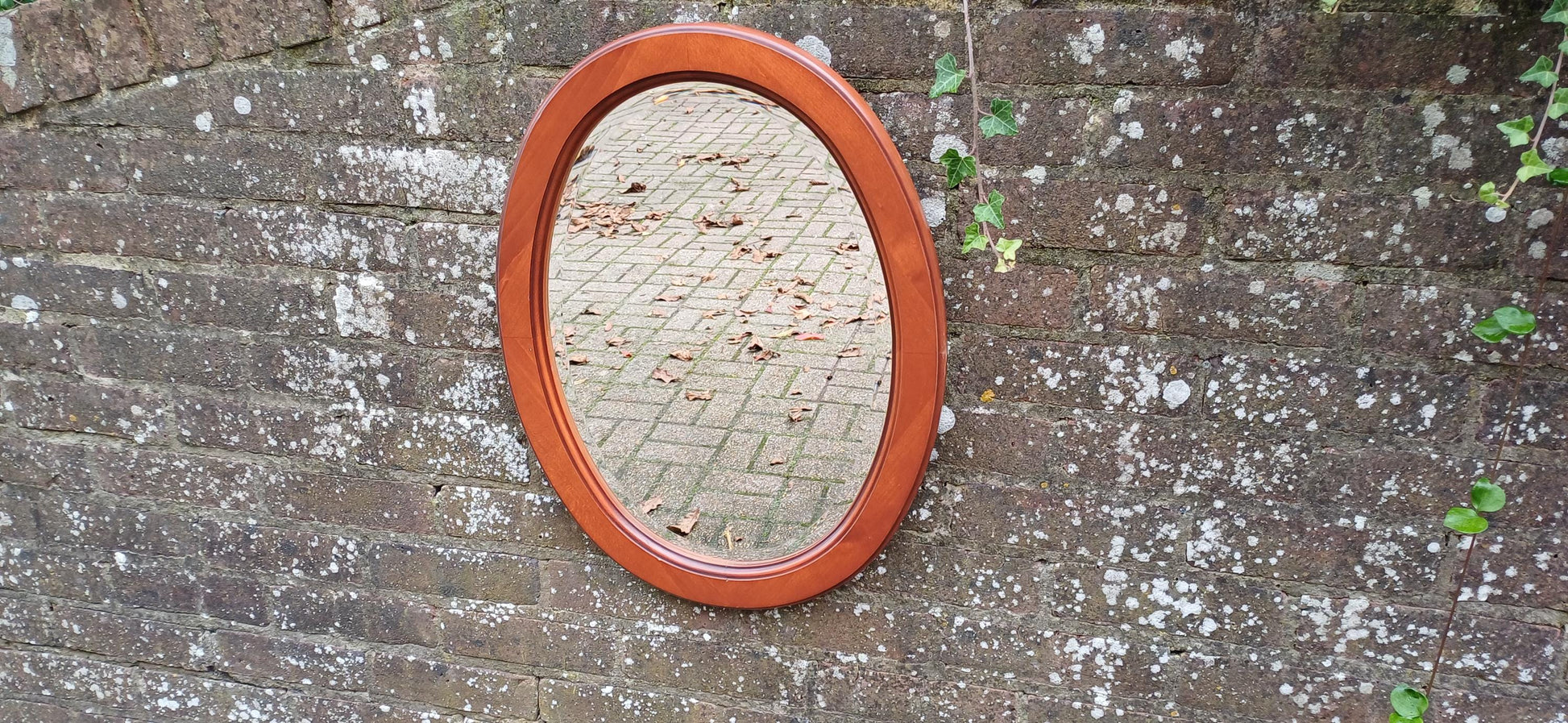 French Fruitwood Oval Decorative Mirror with Bevelled Glass