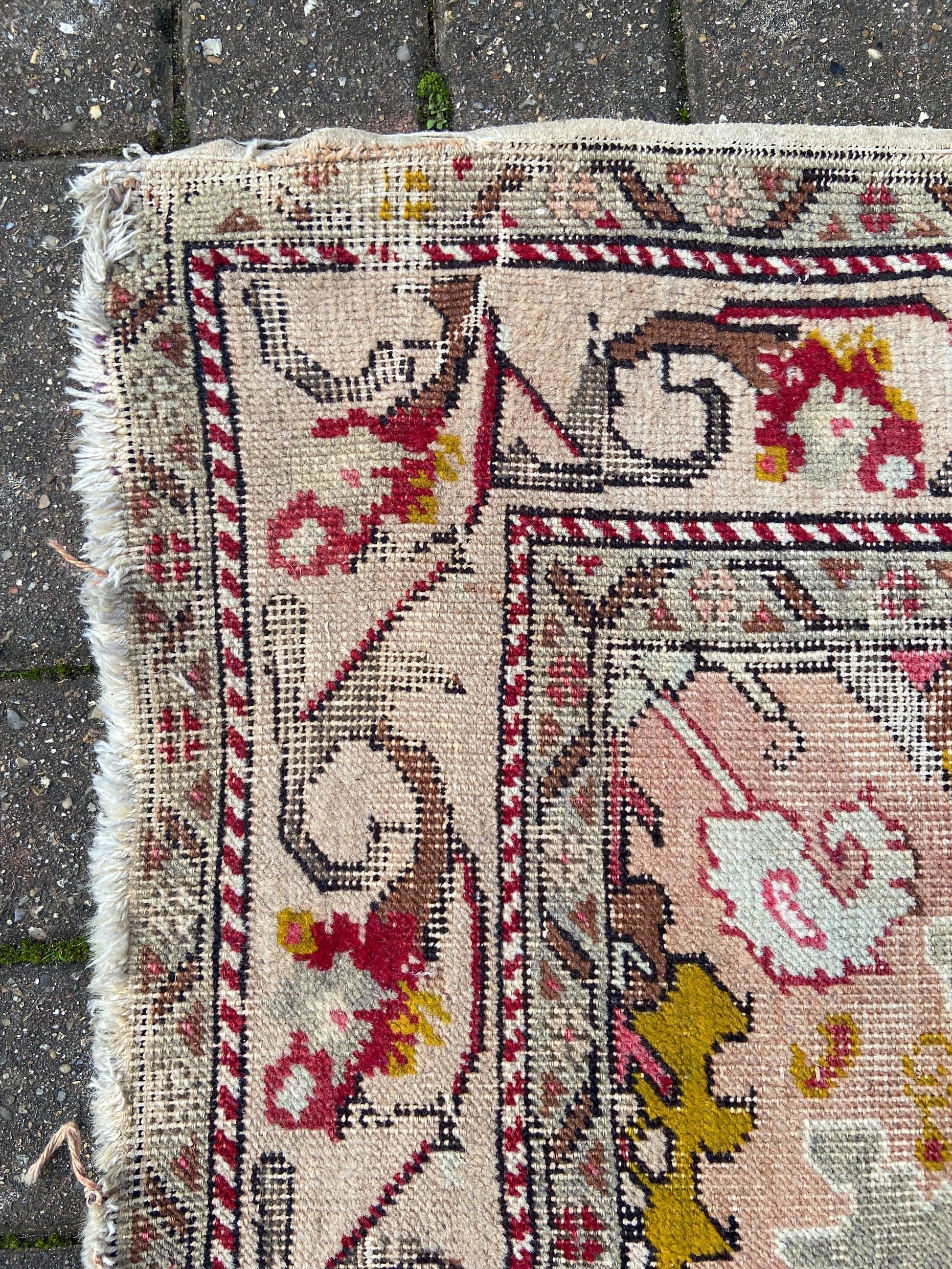 Vintage woollen rug, aged and charming, pinks reds golds (170cm x 106cm)