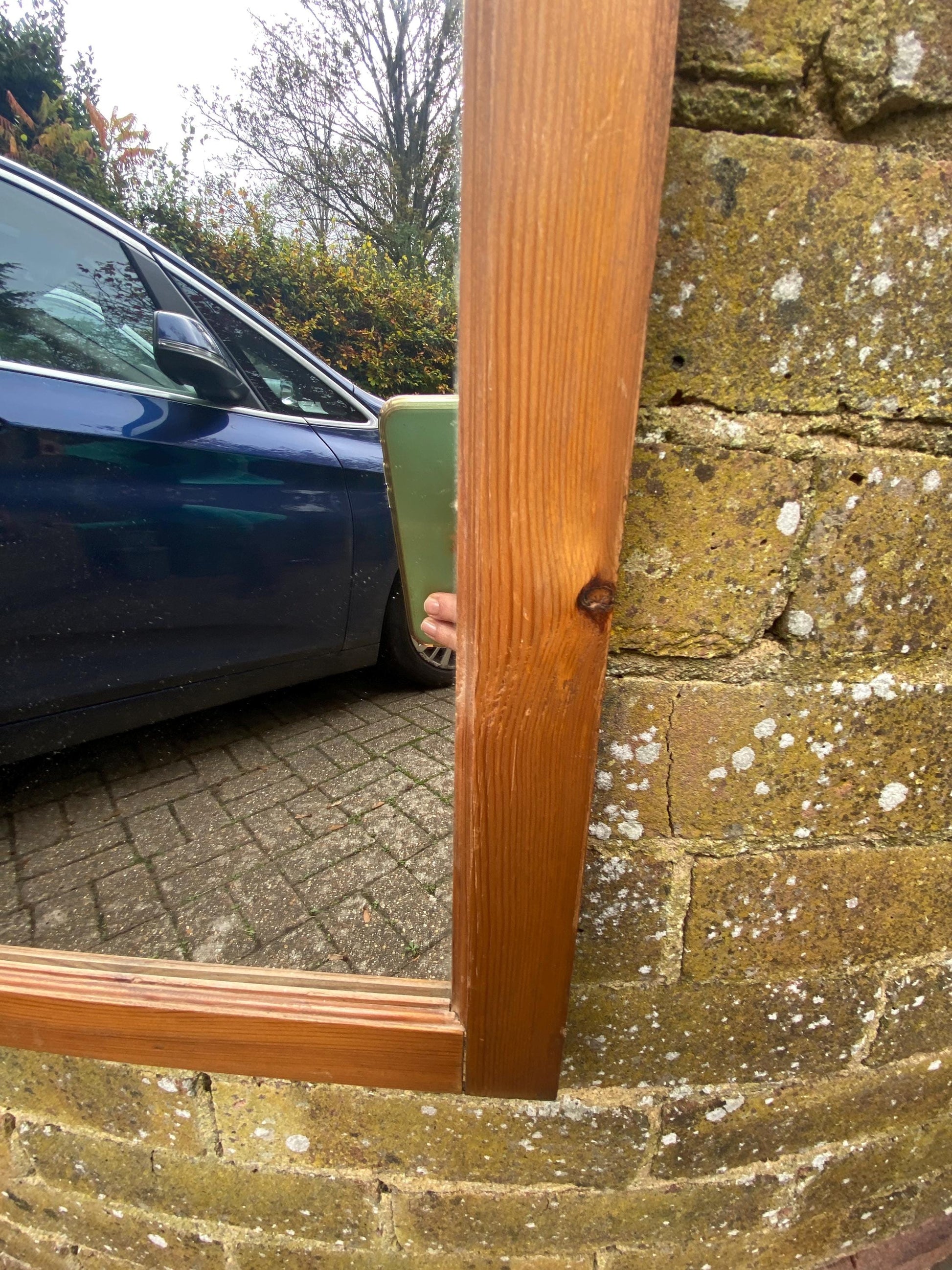 Lovely vintage pine mirror with moulded top and in vgc, ready to hang