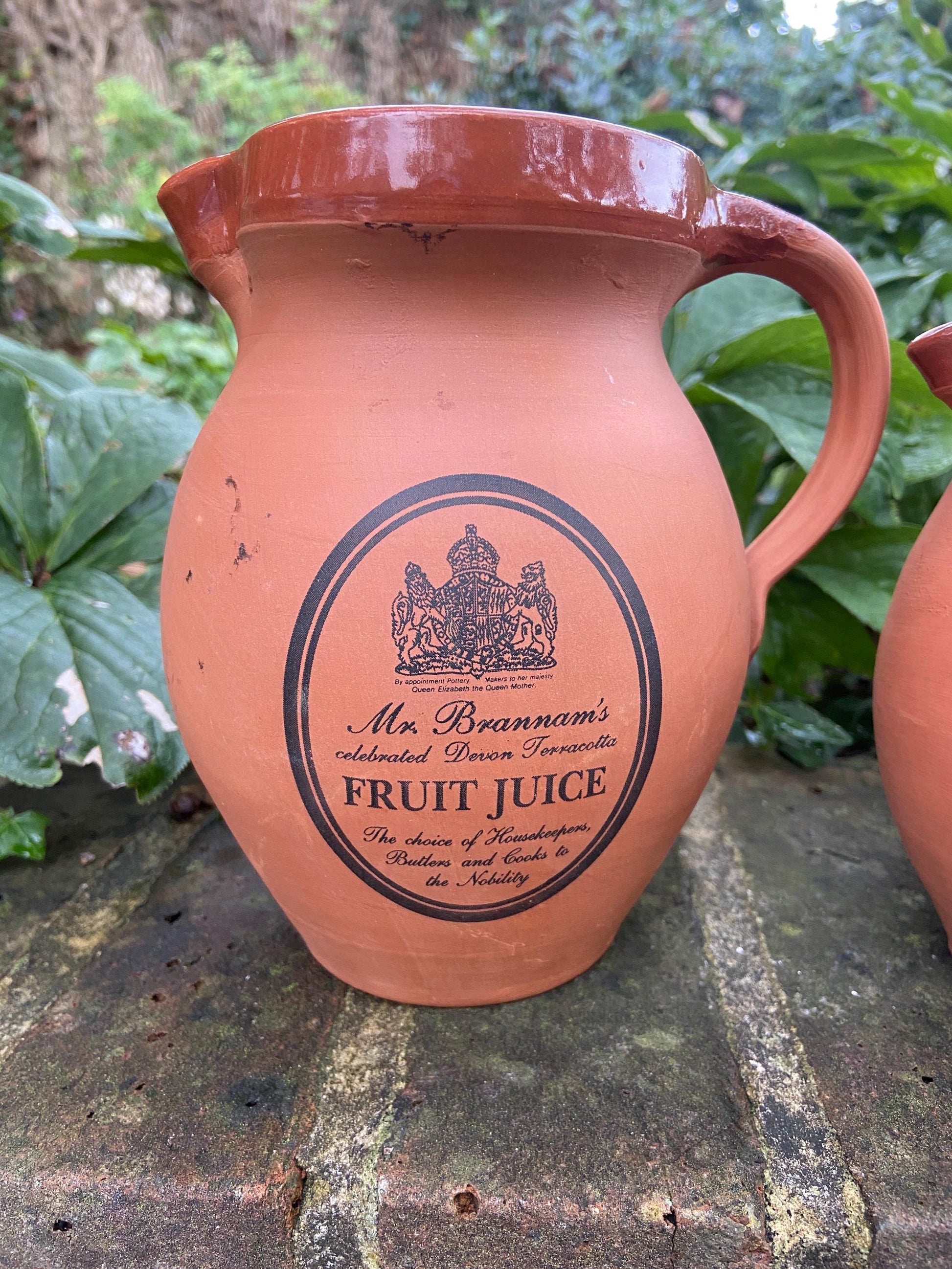 Mrs Brannam’s Devon Terracotta vintage set of two breakfast jugs – one for Fruit Juice and one for Milk. Perfect for a B&B.