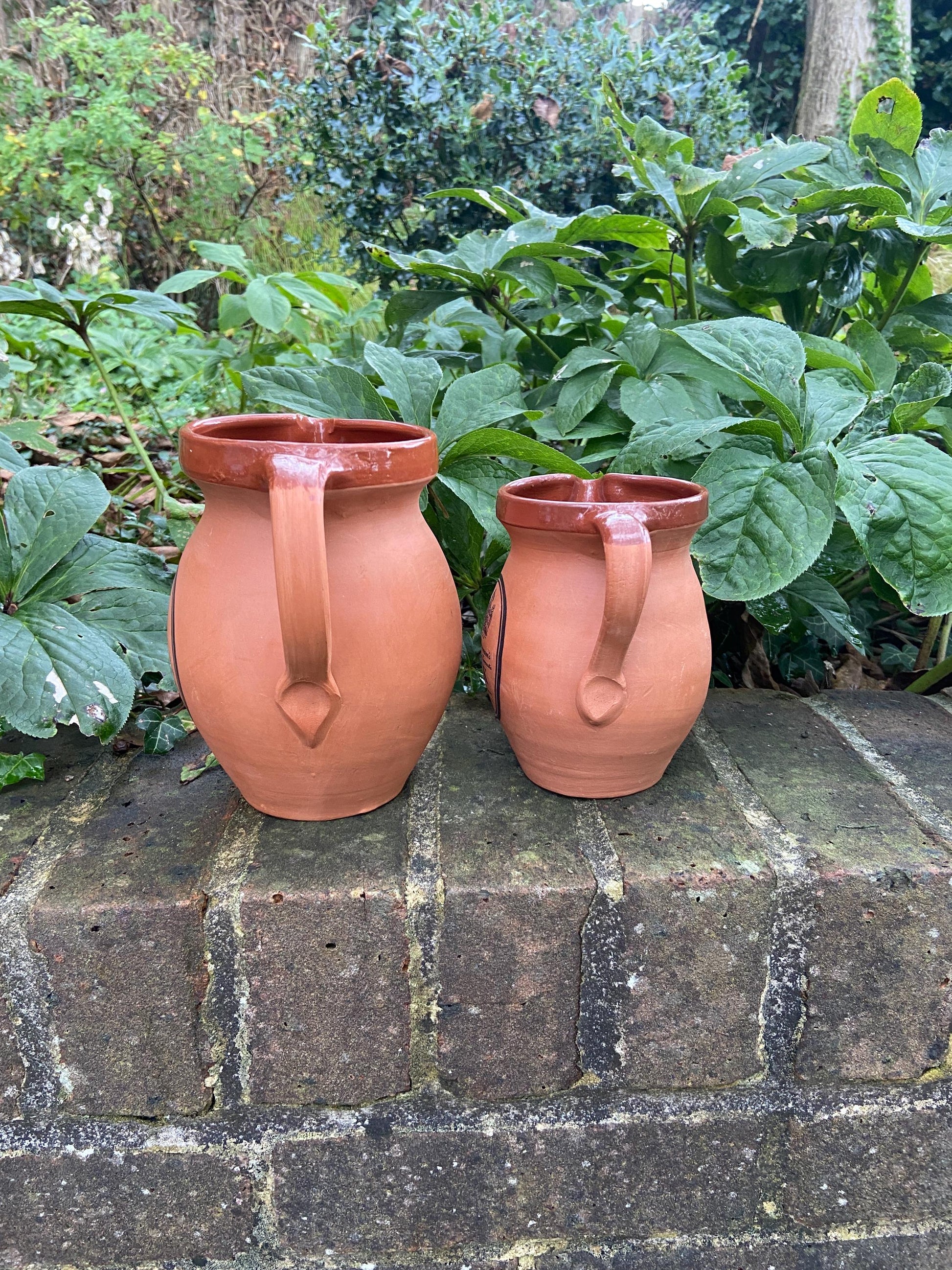 Mrs Brannam’s Devon Terracotta vintage set of two breakfast jugs – one for Fruit Juice and one for Milk. Perfect for a B&B.