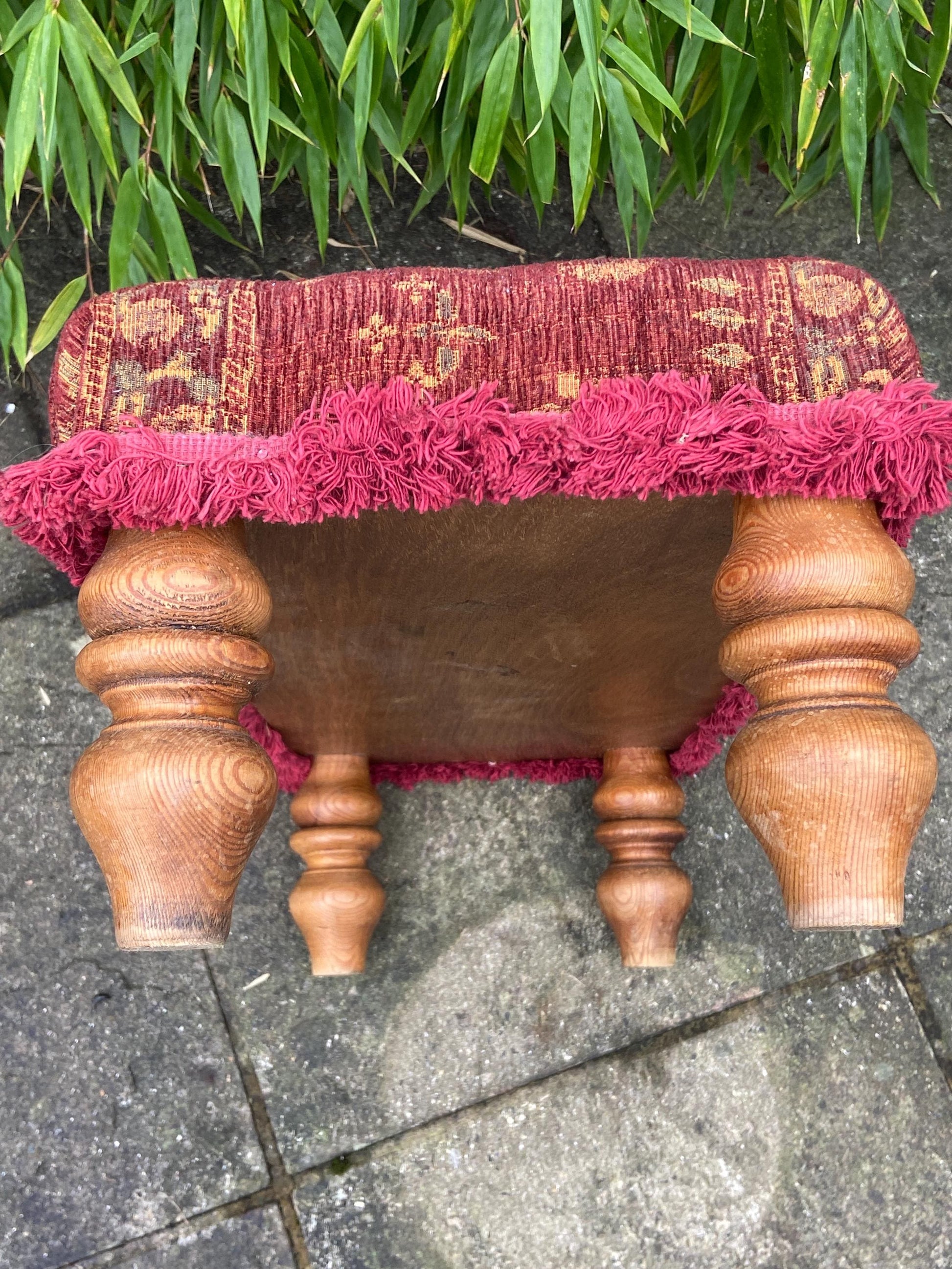 Retro upholstered foot stool - authentic vintage stool with tapestry type upholstery and turned legs (60cm x 23cm x 29cm)