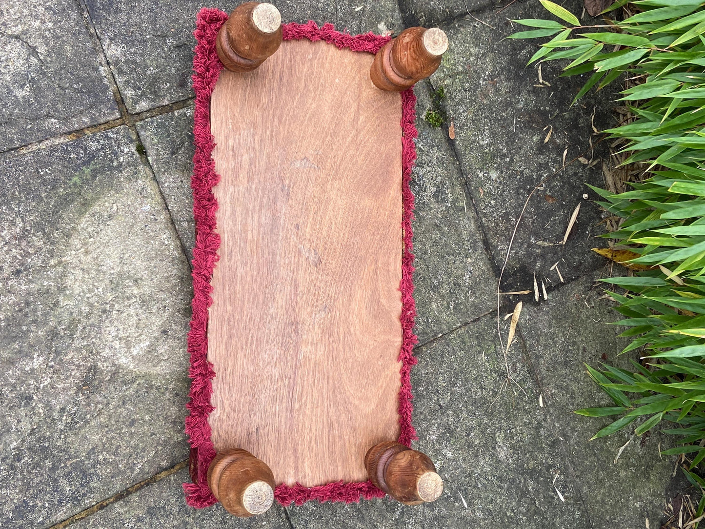 Retro upholstered foot stool - authentic vintage stool with tapestry type upholstery and turned legs (60cm x 23cm x 29cm)