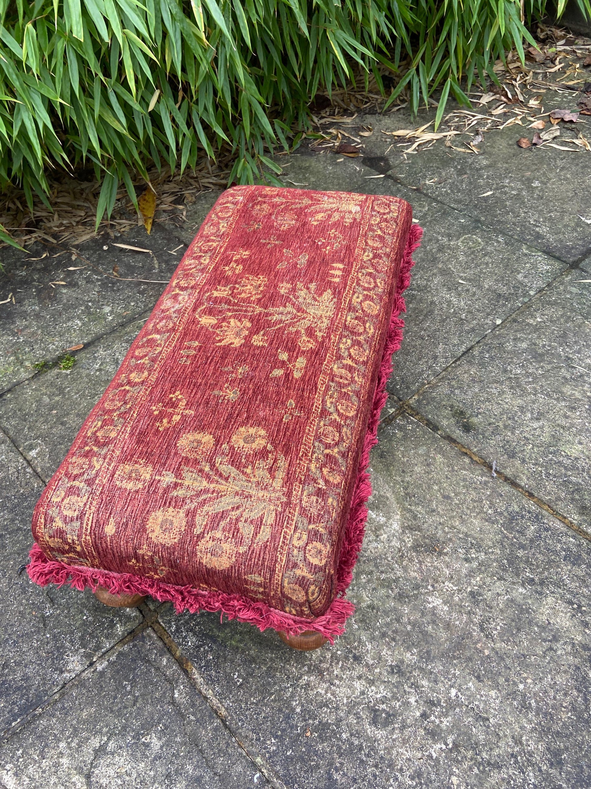 Retro upholstered foot stool - authentic vintage stool with tapestry type upholstery and turned legs (60cm x 23cm x 29cm)