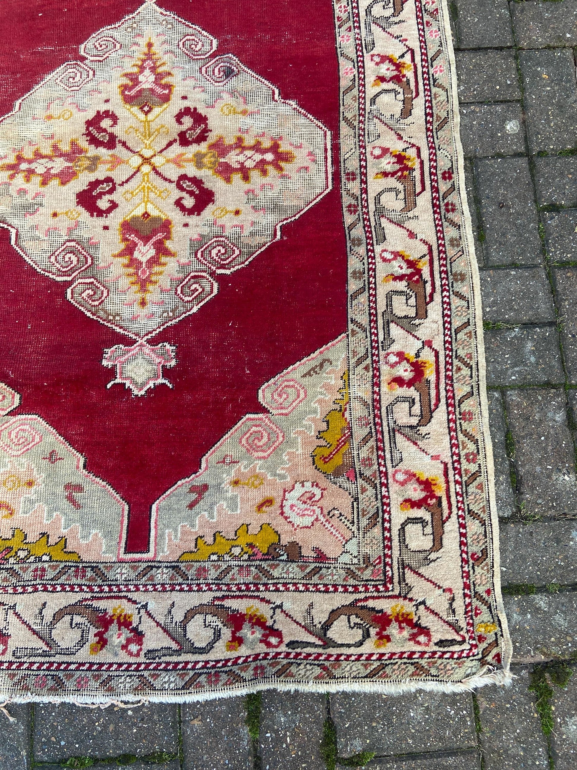 Vintage woollen rug, aged and charming, pinks reds golds (170cm x 106cm)