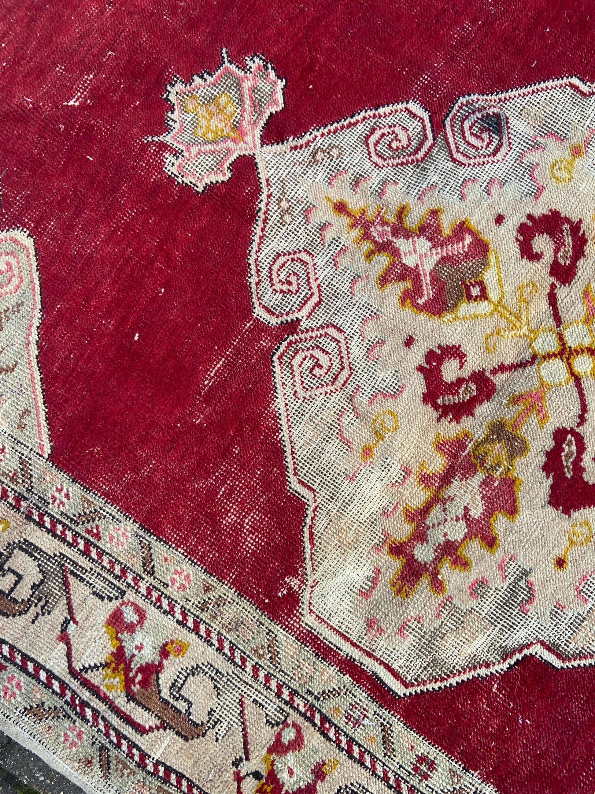 Vintage woollen rug, aged and charming, pinks reds golds (170cm x 106cm)