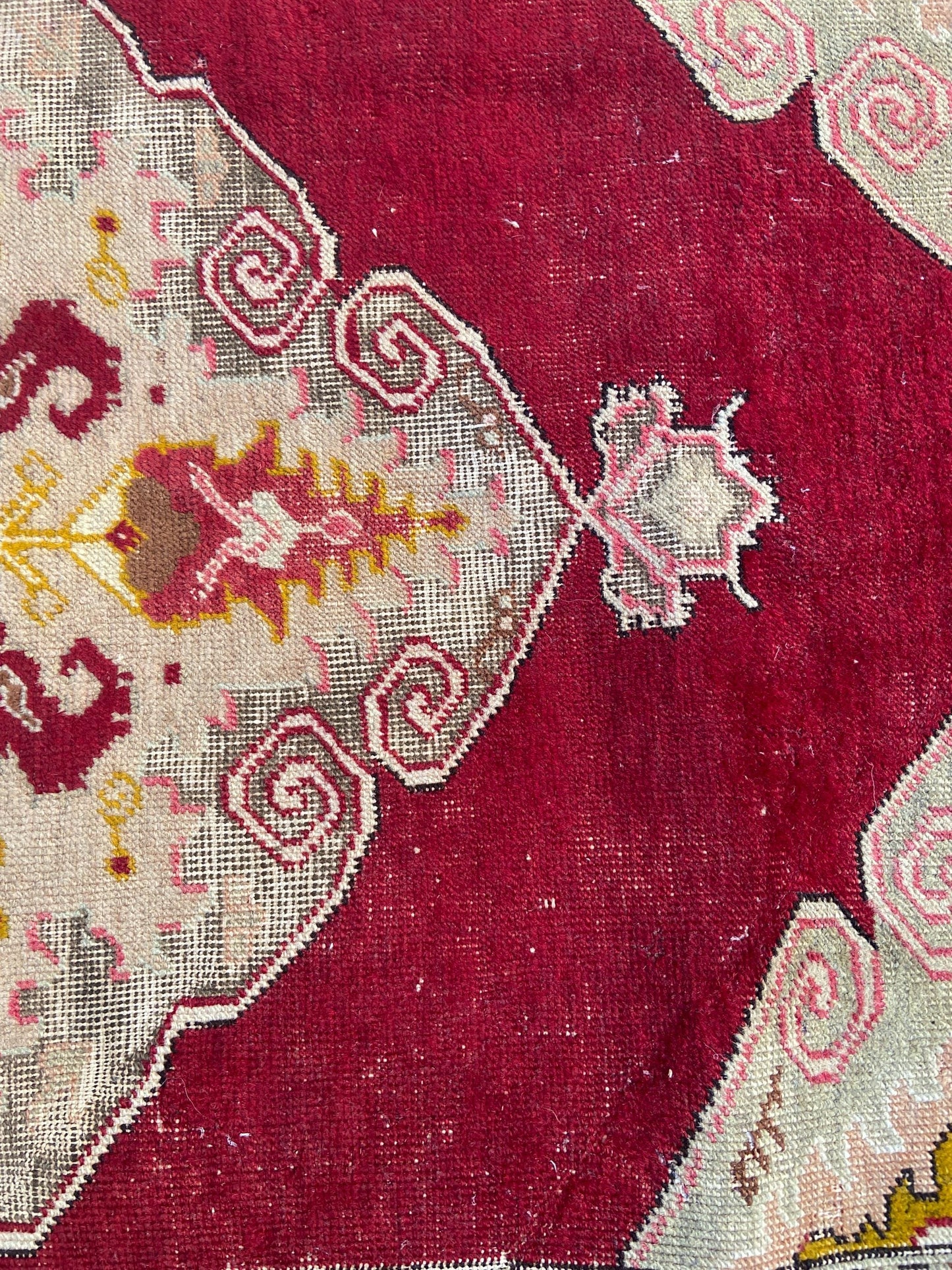 Vintage woollen rug, aged and charming, pinks reds golds (170cm x 106cm)