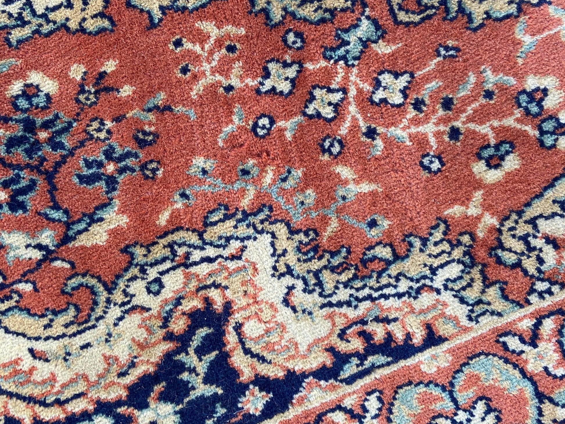 Vintage quality traditional woollen pile rug 140cm x 79cm, deep apricot orange
