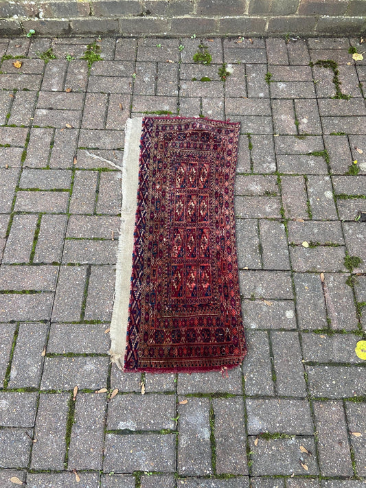 small woollen rug; used and aged. perfect for feet or foot rug.