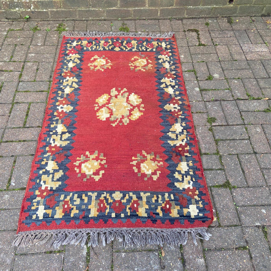 wool rug. kilim style. red and blue black. vintage rug.