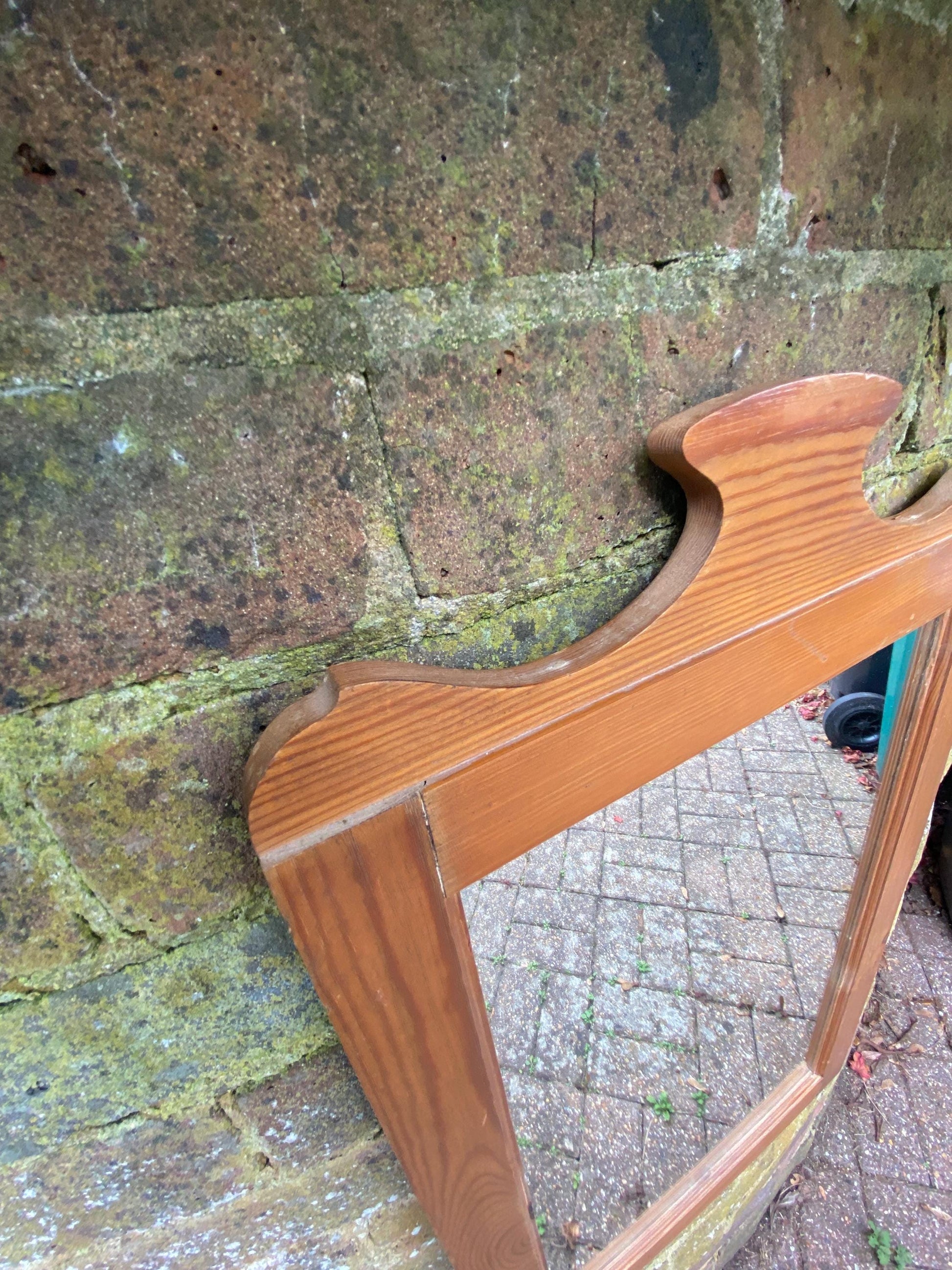 Lovely vintage pine mirror with moulded top and in vgc, ready to hang