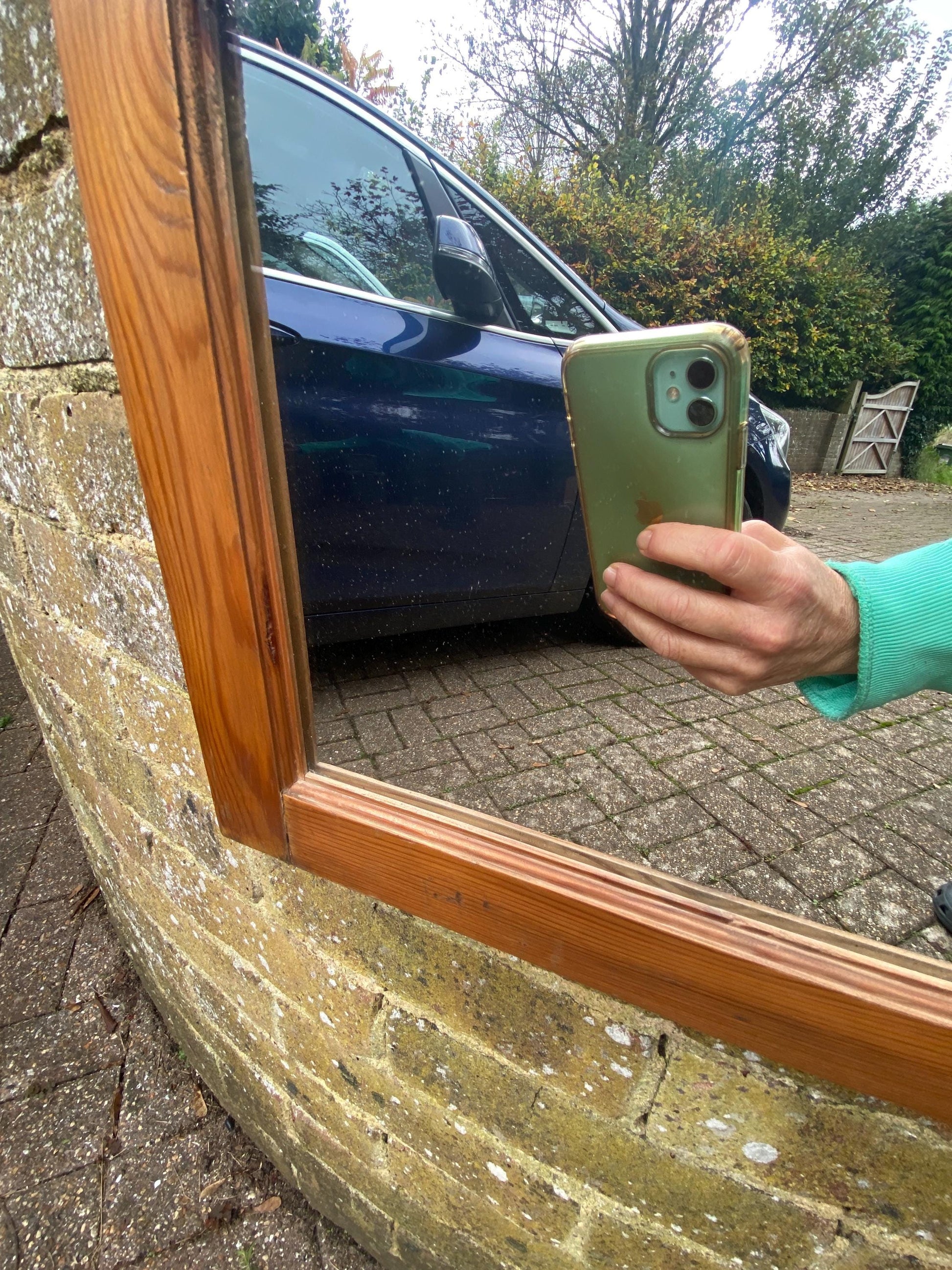 Lovely vintage pine mirror with moulded top and in vgc, ready to hang