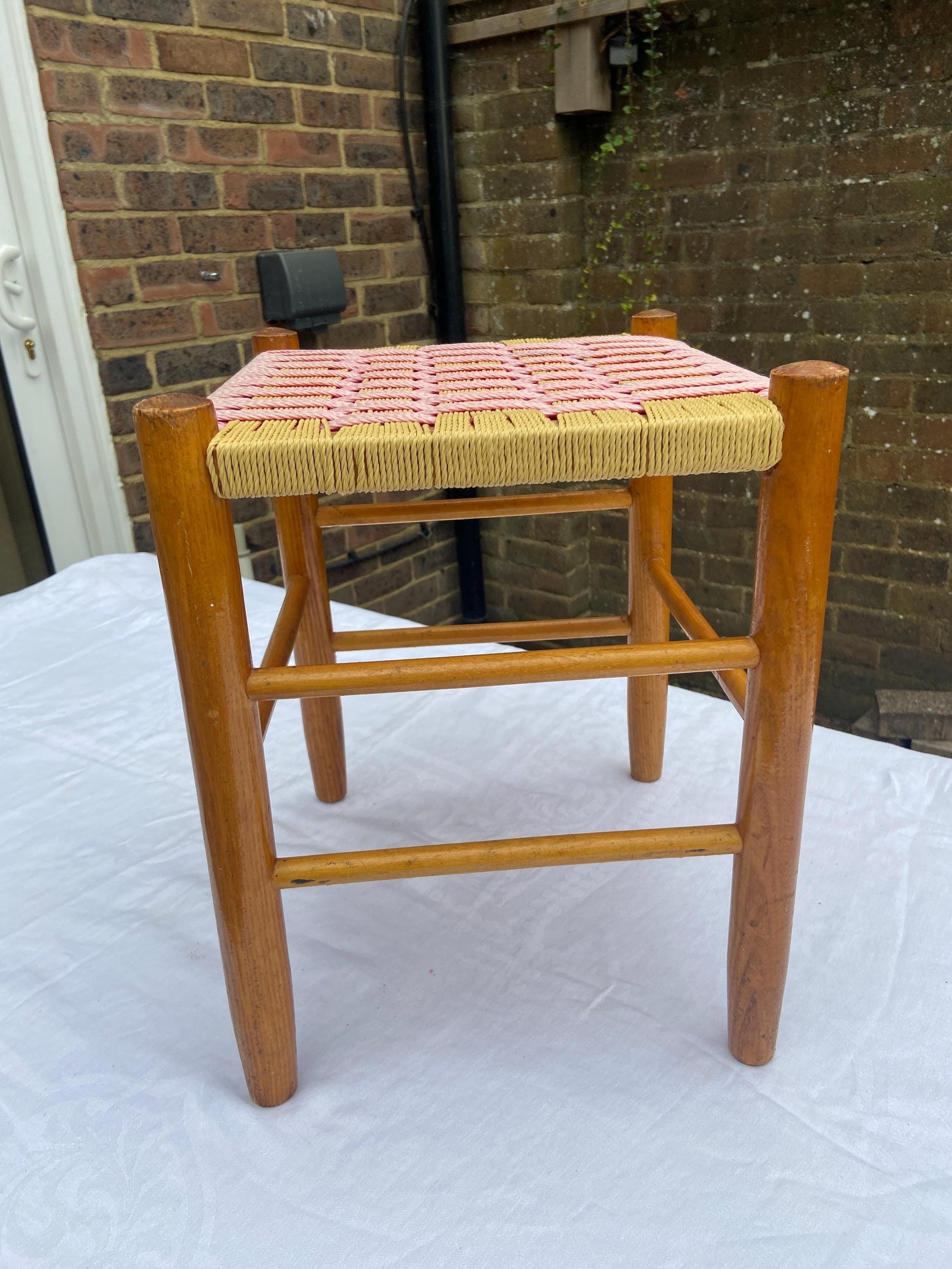 Retro vintage pink and cream woven string stool with golden wooden frame - vgc
