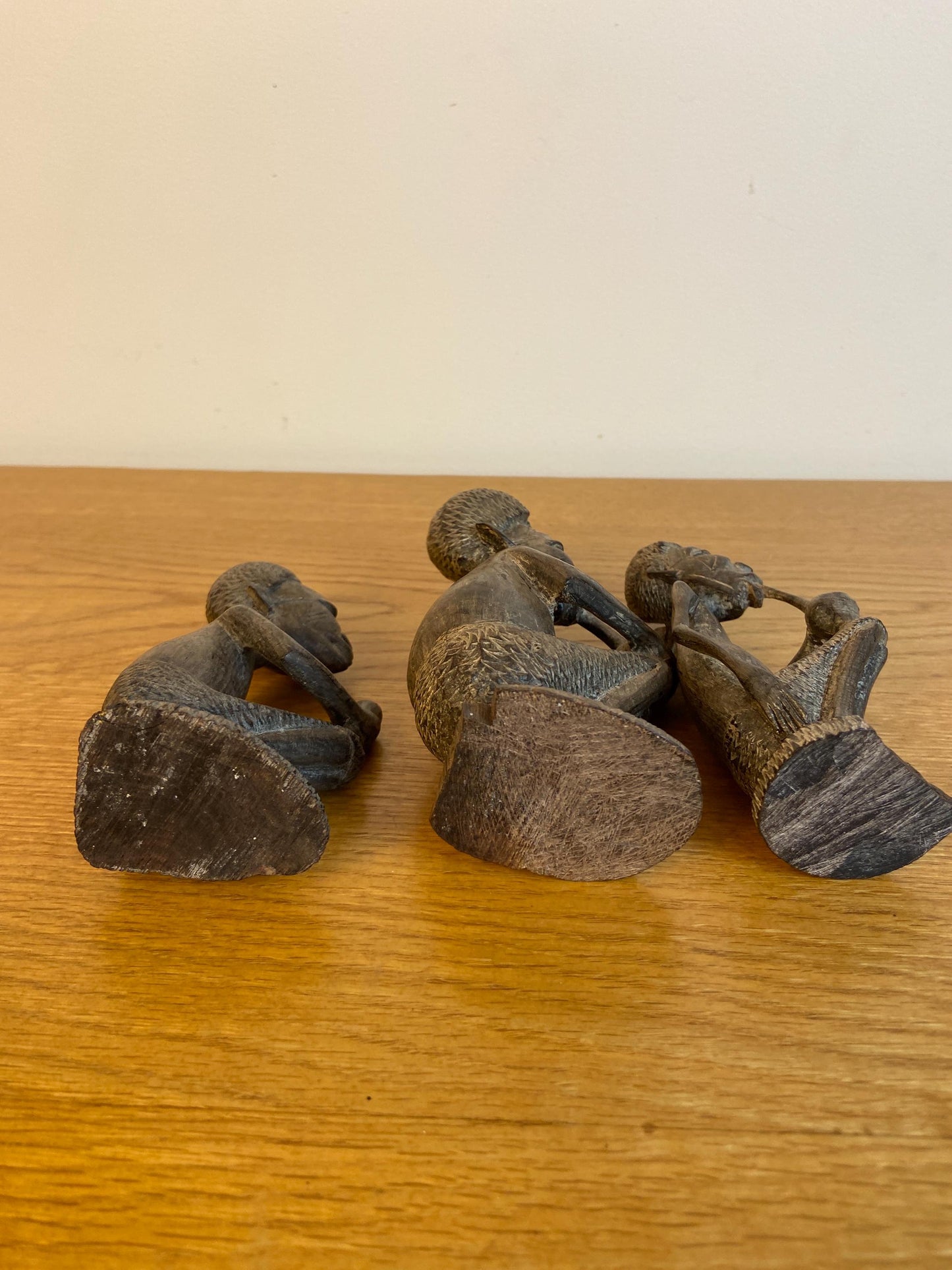 Three wonderful African carved wooden figurines, Traditional style Three Men carved out of wood