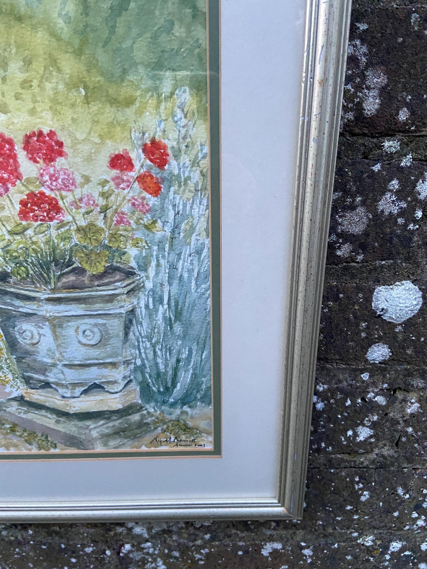 Geraniums in Urn an Original watercolour by Nigel Fox Bassett 2003; professionally mounted and framed.