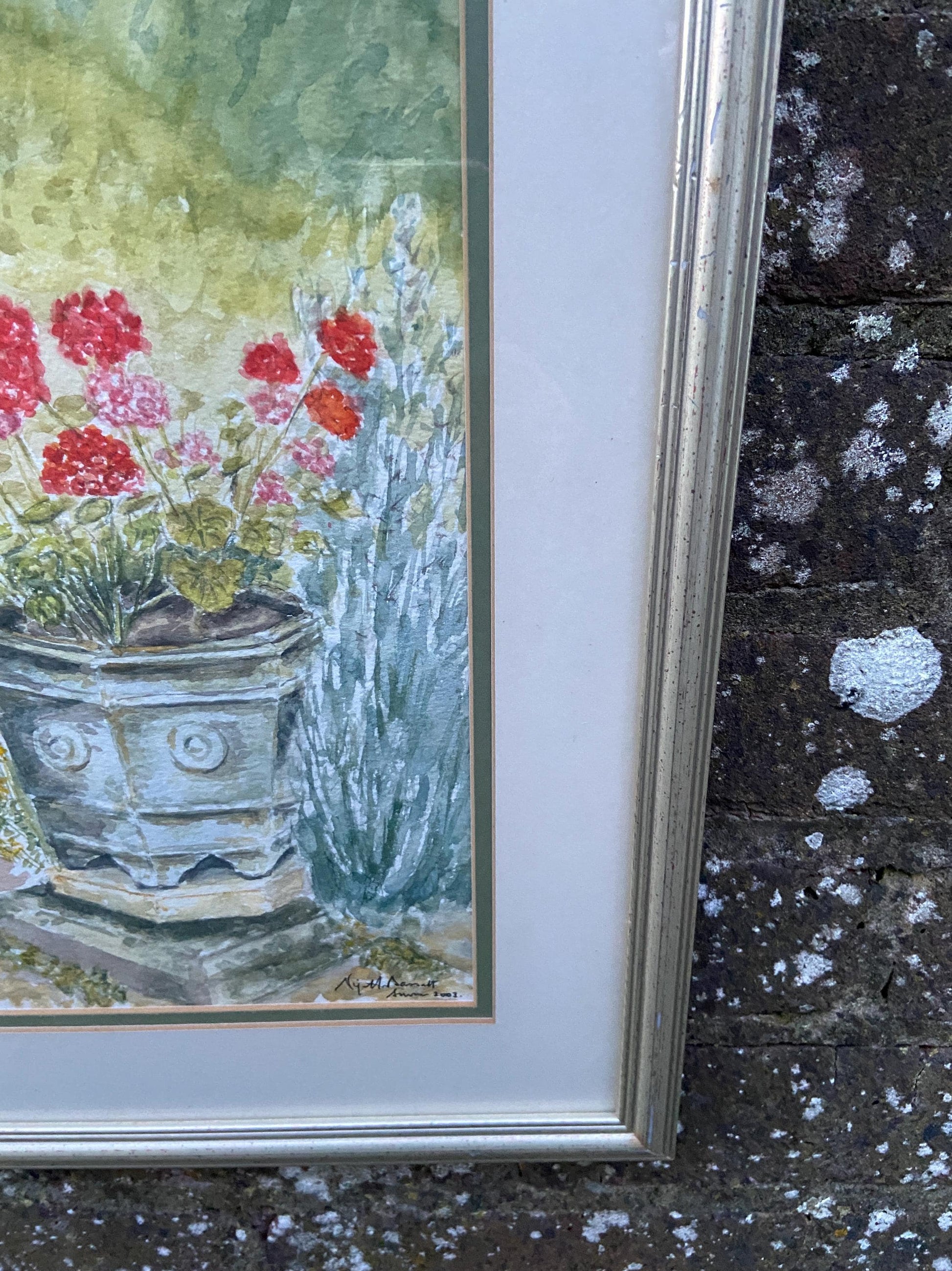 Geraniums in Urn an Original watercolour by Nigel Fox Bassett 2003; professionally mounted and framed.