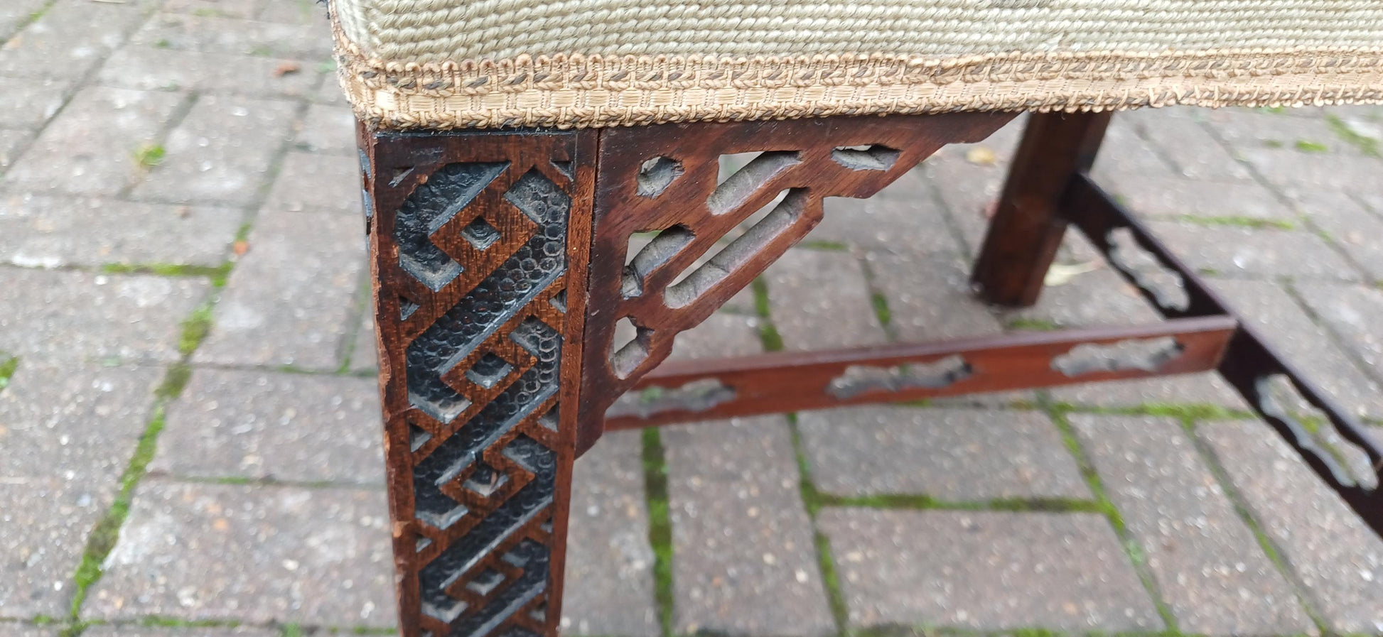 Antique Mahogany Stool with Tapestry Seat, Ornate Carved Details & Fretwork Accents – Elegant Vintage Vanity Piece Age Worn
