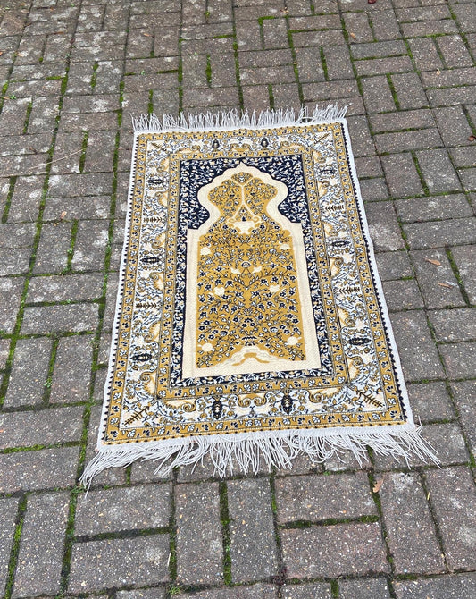 wonderful vintage woollen rug; Turkish prayer mat style.  bold colours in mustard yellow, black and cream. small size. vgc