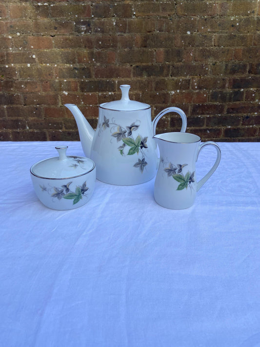 quality part tea service or coffee dinner service comprising tea pot , sugar bowl and milk jug. Classic Noritake china KERRIE