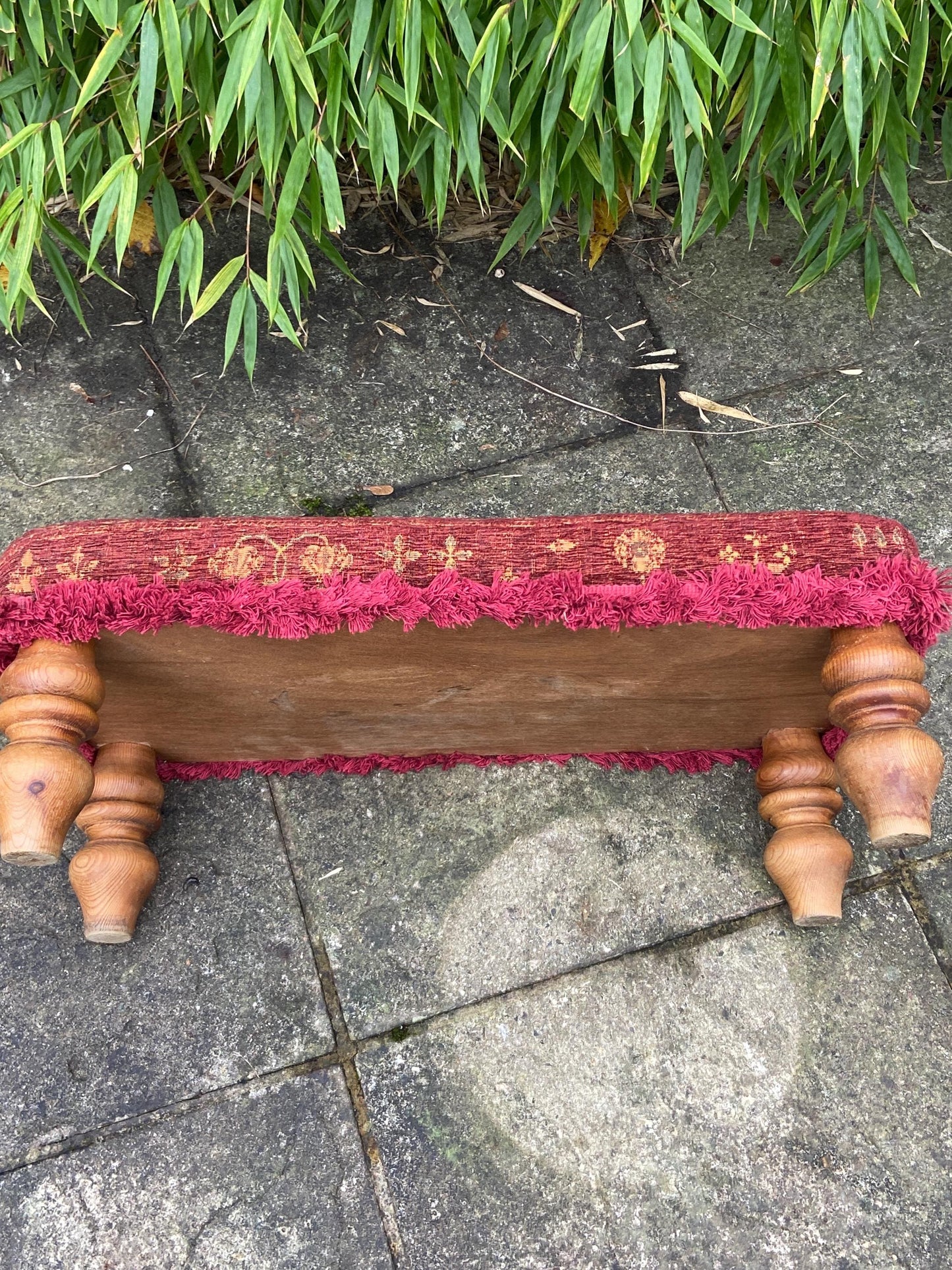 Retro upholstered foot stool - authentic vintage stool with tapestry type upholstery and turned legs (60cm x 23cm x 29cm)